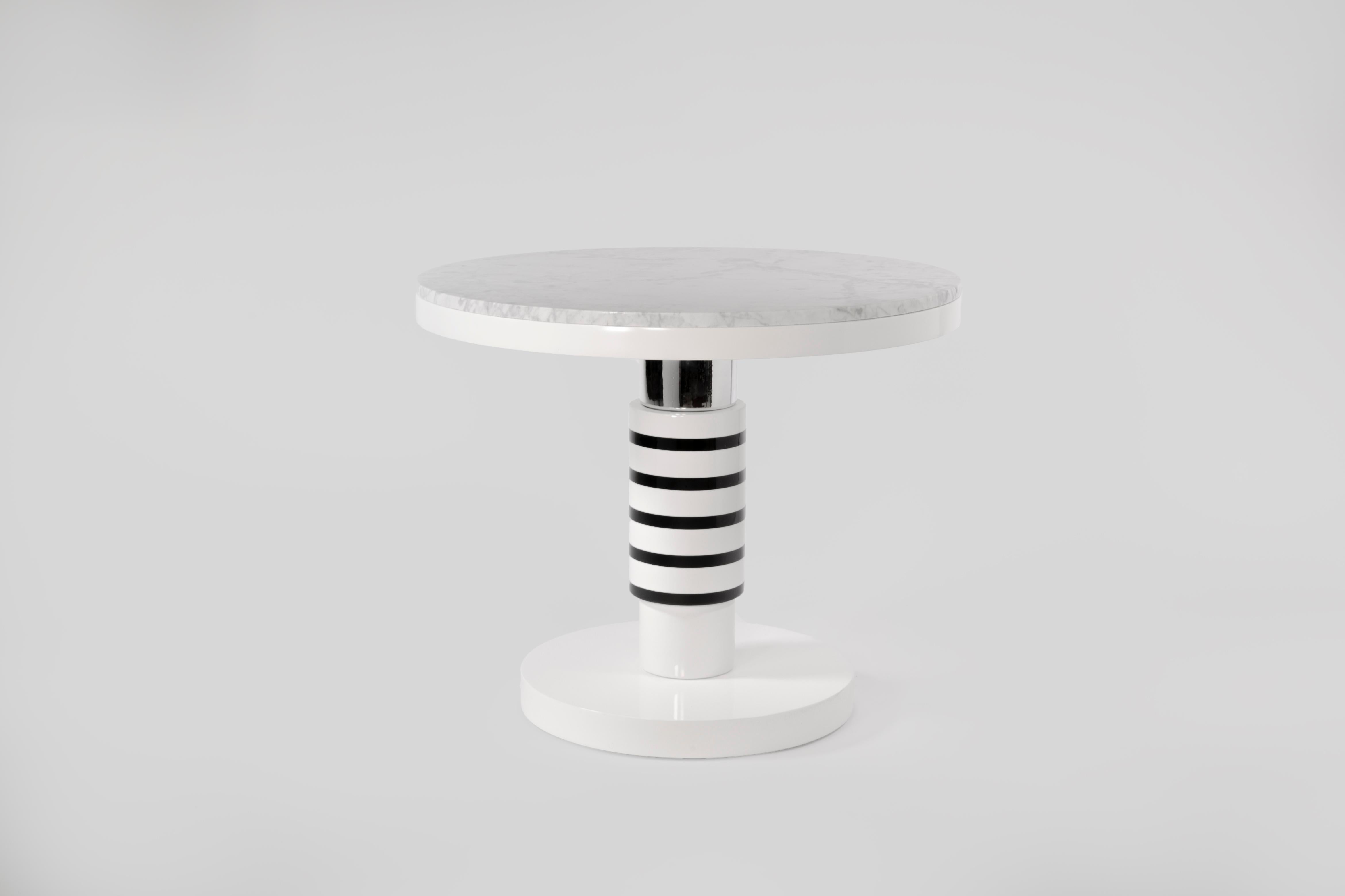 Marble and ceramic large coffee table by Eric Willemart
Materials: Top: Polished Carrara marble paate embedded in a White Lacquered 
 Wooden Tray
 Body: Handcrafted ceramic glazed in black, white and silver finishes
Base: White lacquered wood on