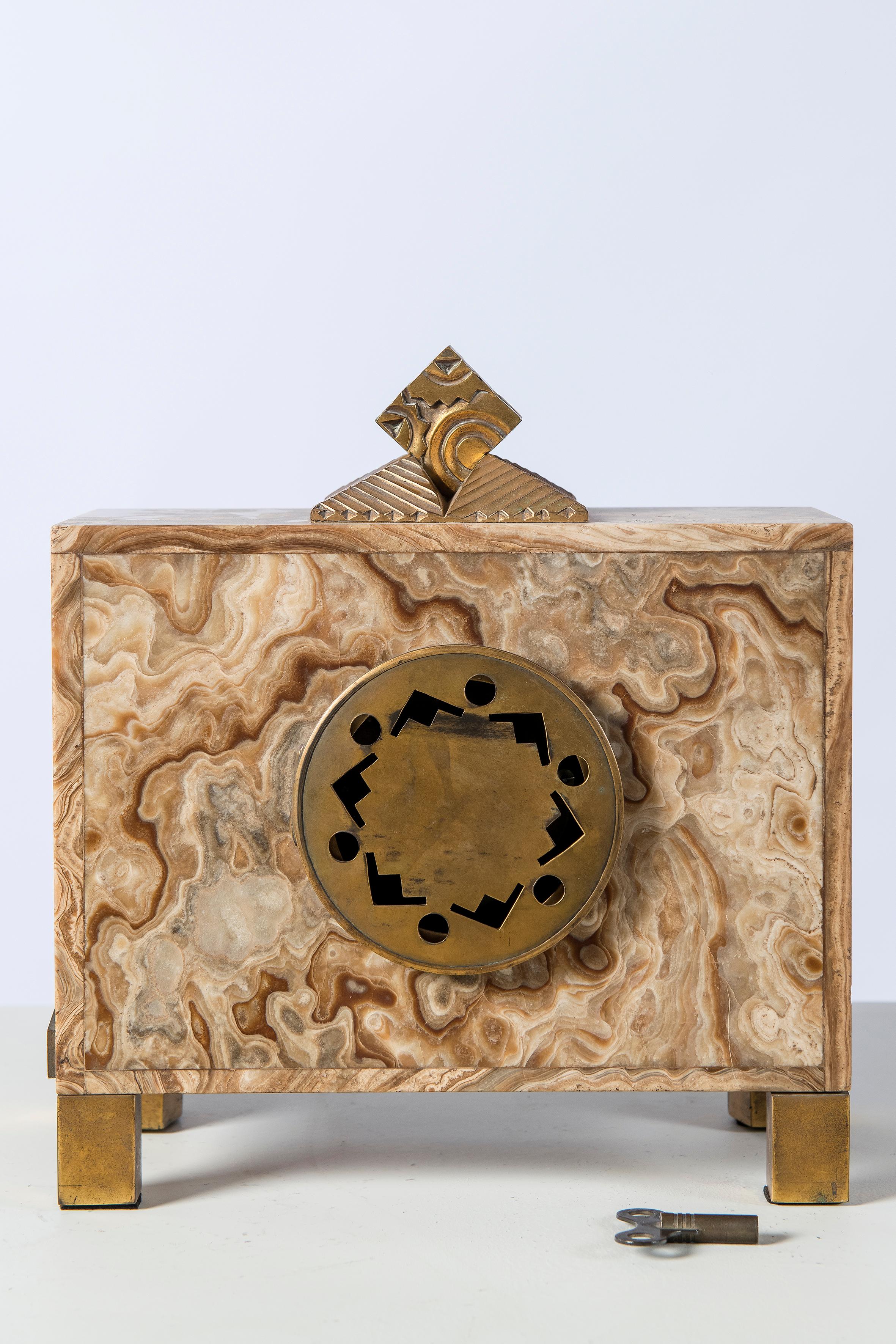 Marble and gilt bronze clock. Machine signed Bonnet and Pottier, France, 1920.