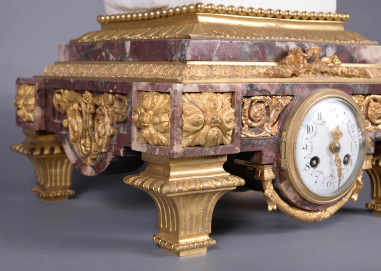 Marble and gilt bronze clock surmounted by a statuary white marble sculpture For Sale 4