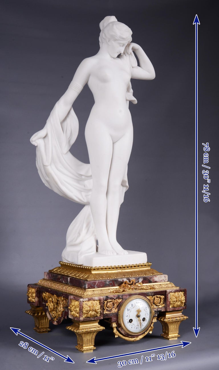 Marble and gilt bronze clock surmounted by a statuary white marble sculpture For Sale 8