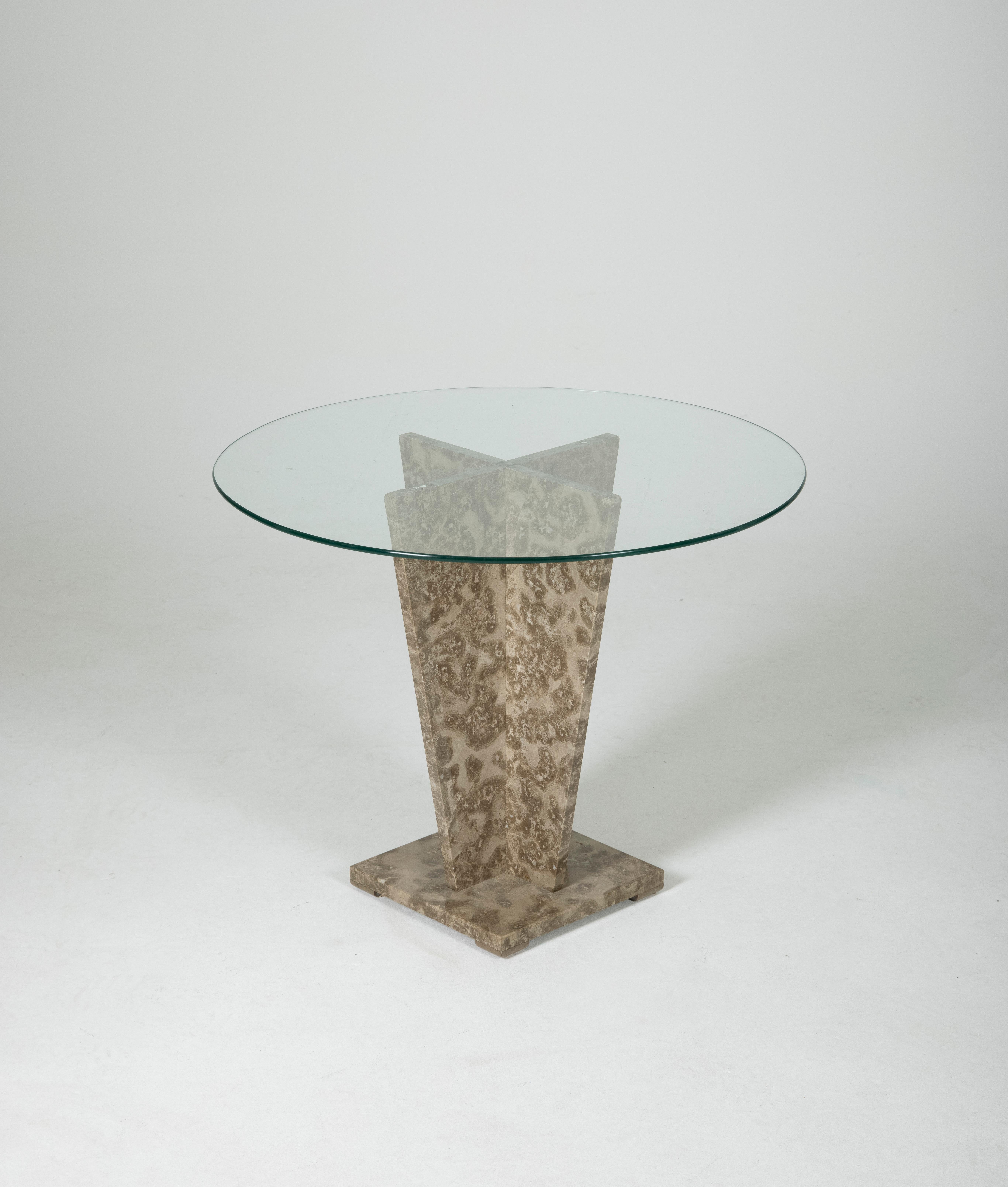 Pedestal table with a marble base and glass top, from the 1970s. In very good condition.
LP690