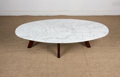 Mesa baja de mármol y palisandro de Hugues Poignant para Roche et Bobois 1970.