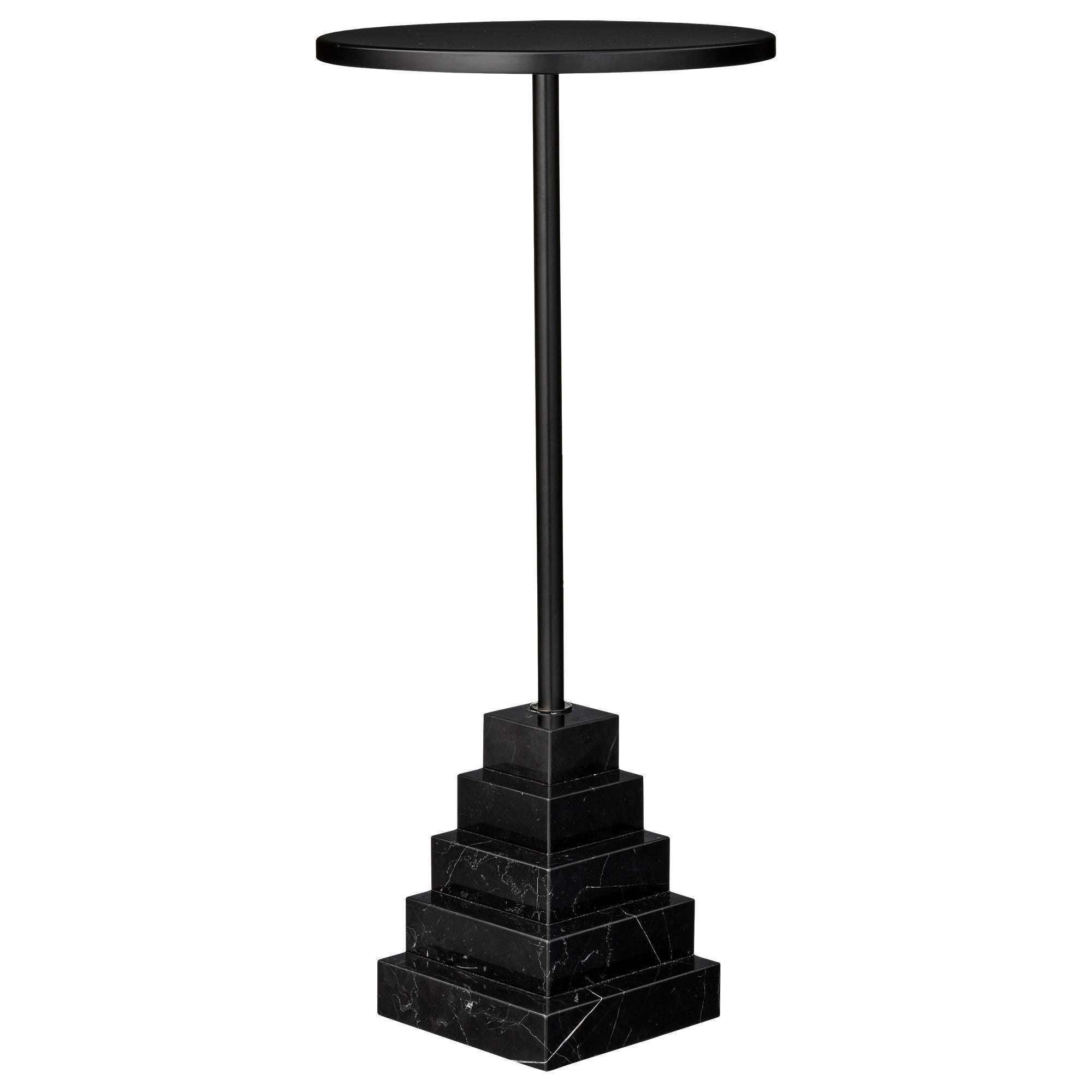Marble and steel black top side table
Dimensions: Ø32 x H 67 cm
Materials: Steel, marble base

The unique shape will make them stand out in any room in the home and truly appear as pieces of art. The tables are made of a foot in marble or