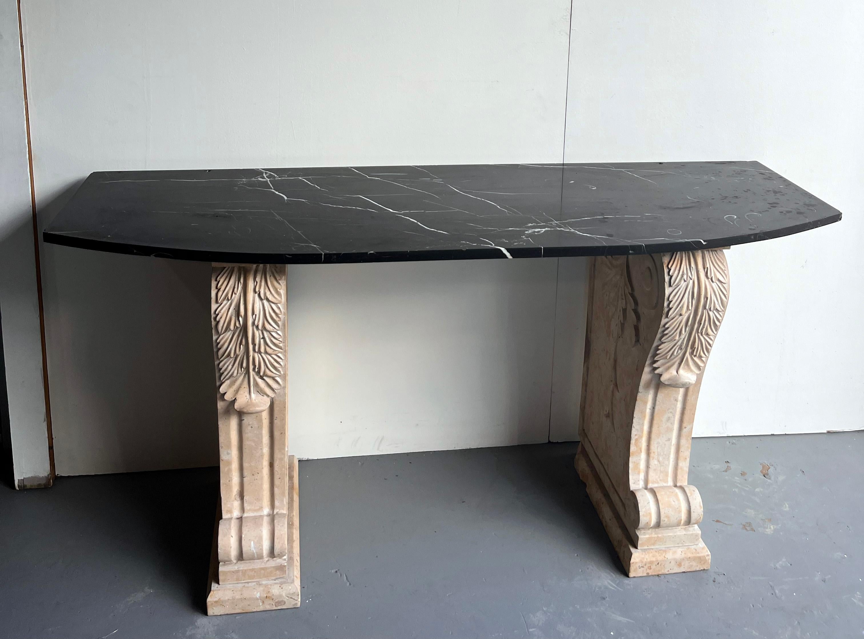 Marble top on stone supports
This  Consol Table .could be for an  outside garden elements or inside entrance hall or terrasse.
Neo Classical Style.