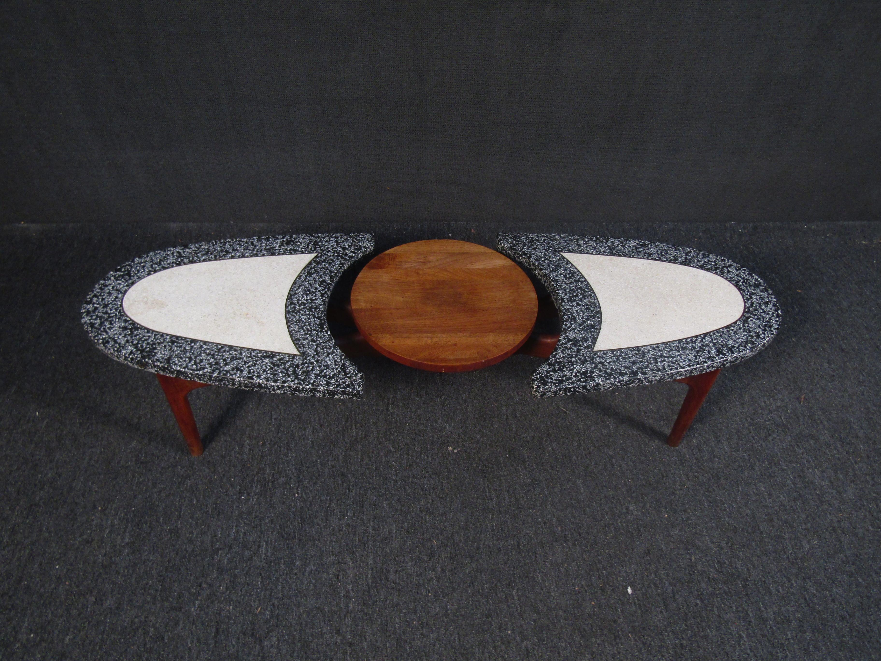 A striking and unique coffee table combining rich woodgrain with different shades of marble, styled after Adrian Pearsall. Please confirm item location with seller (NY/NJ).