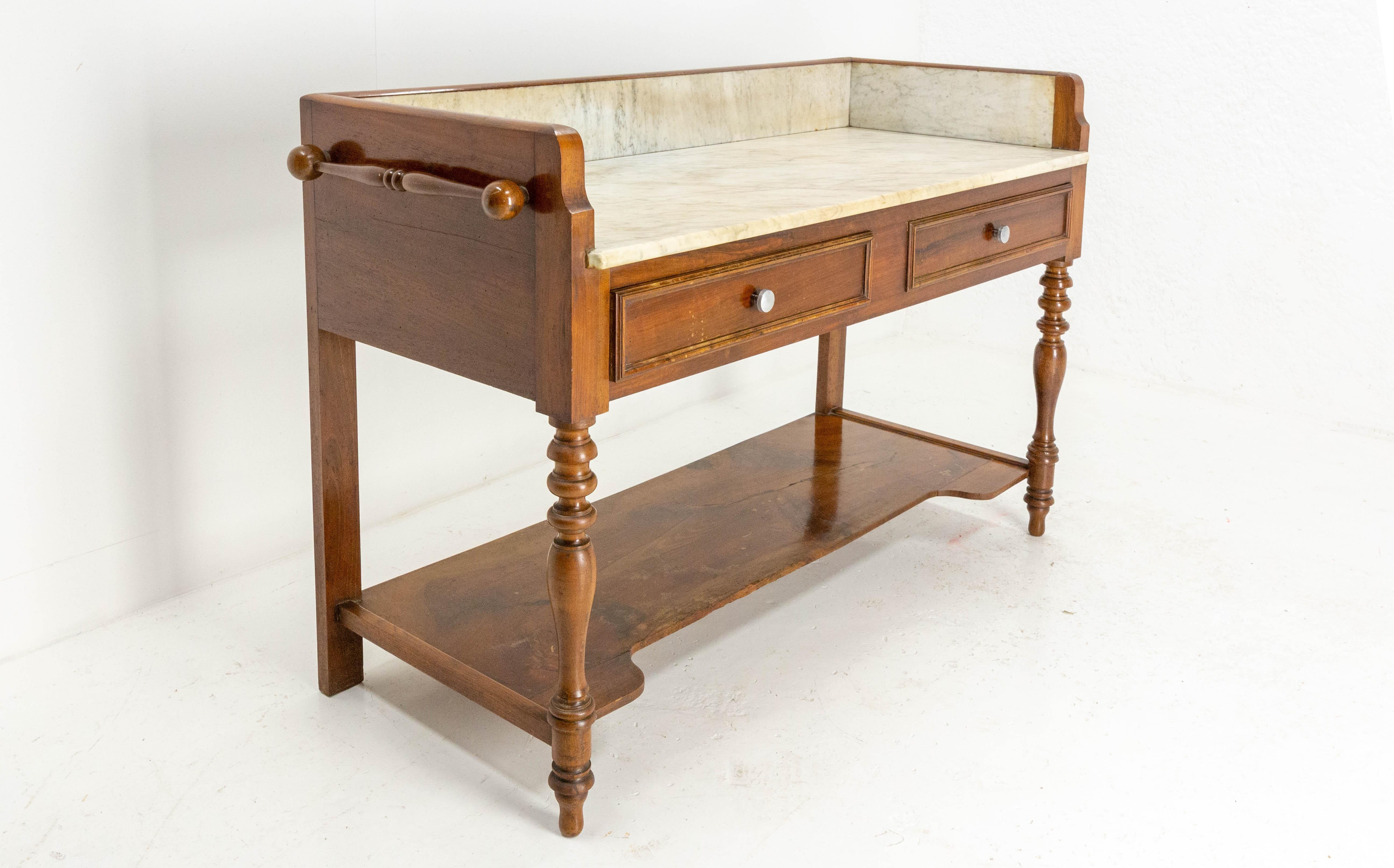 Vanity dressing table
Marble and walnut wood
France circa 1900
Dimension below the table W 47.24 in. (120 cm) D 20.08 in. (51 cm)
Ideal for a double vanity
Good condition, marks in the marble (see photos)
The last four photos are the most accurate