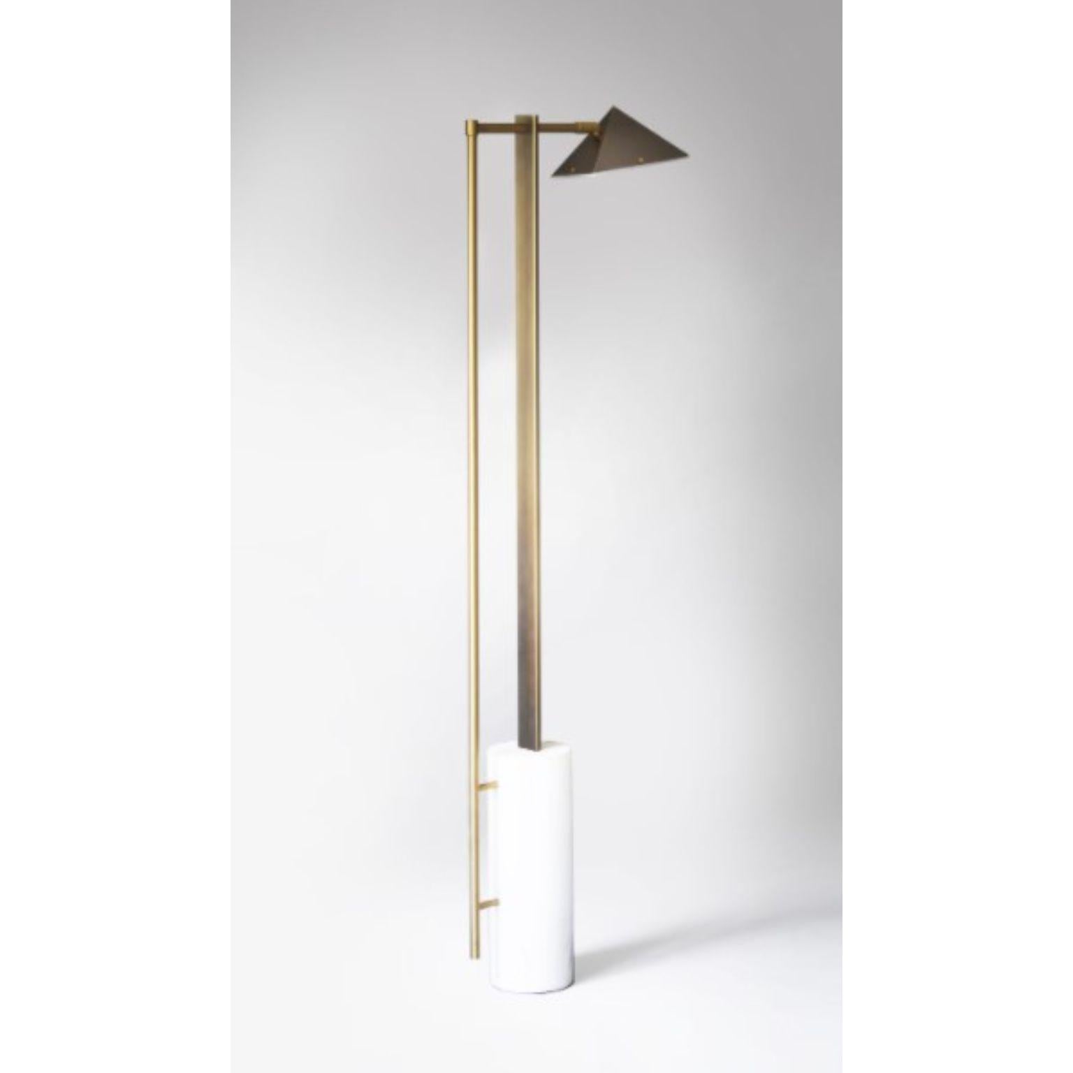 Marble and wedge floor lamp by Square in Circle
Dimensions: D 40 x W 43.5 x H 147.2 cm
Materials: Brushed brass/ brushed grey metal/ white marble/ white frosted perspex
Other finishes available.

Our floor lamp is inspired by Bauhaus geometry