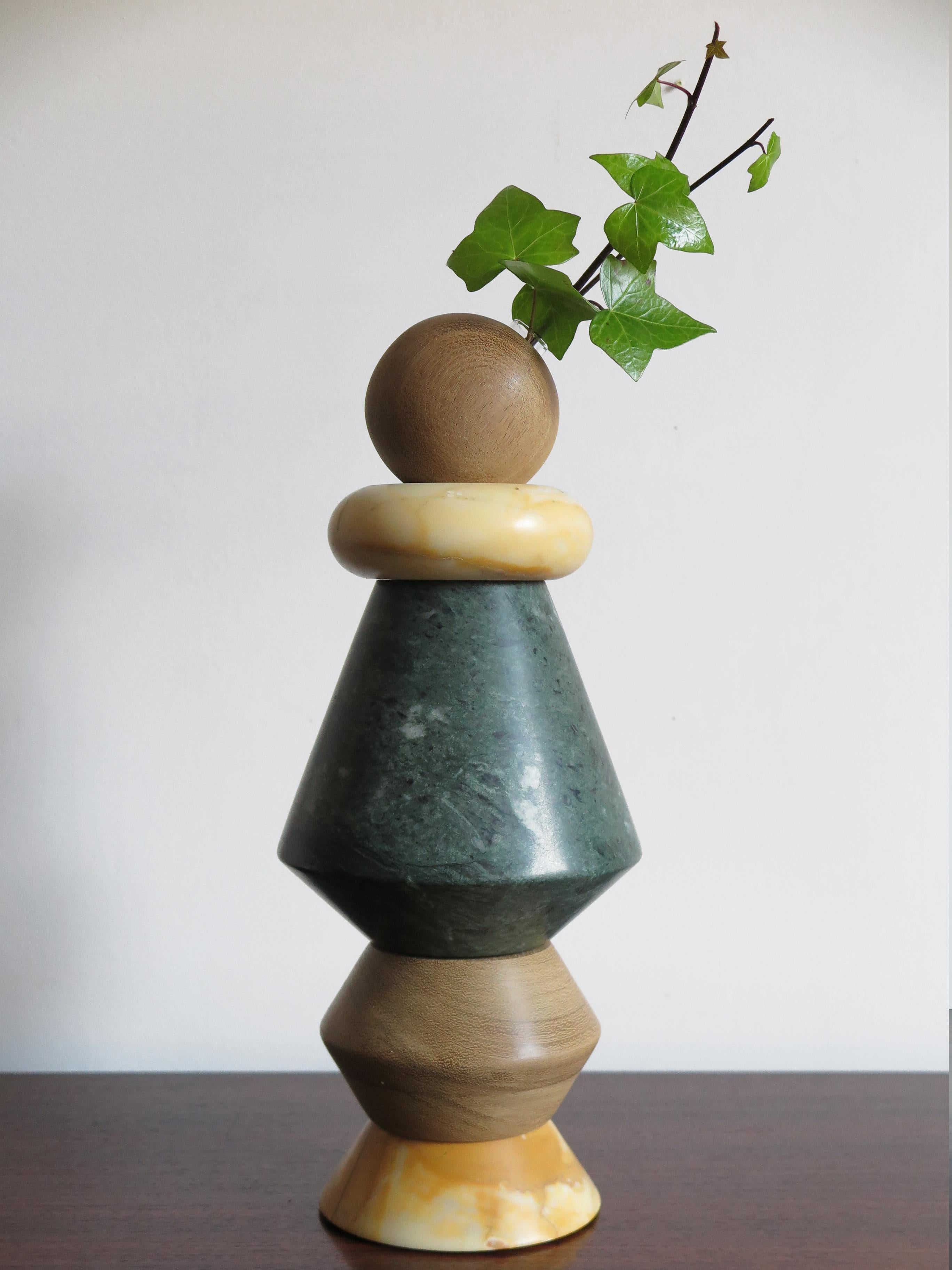 Large sculpture, candle holder and flower vase, modular as you like made up of
Verde Alpi and Giallo Siena marbles, and solid wood with including glass tubes for fresh flowers.
New design Capperidicasa

Designed for large, contemporary and