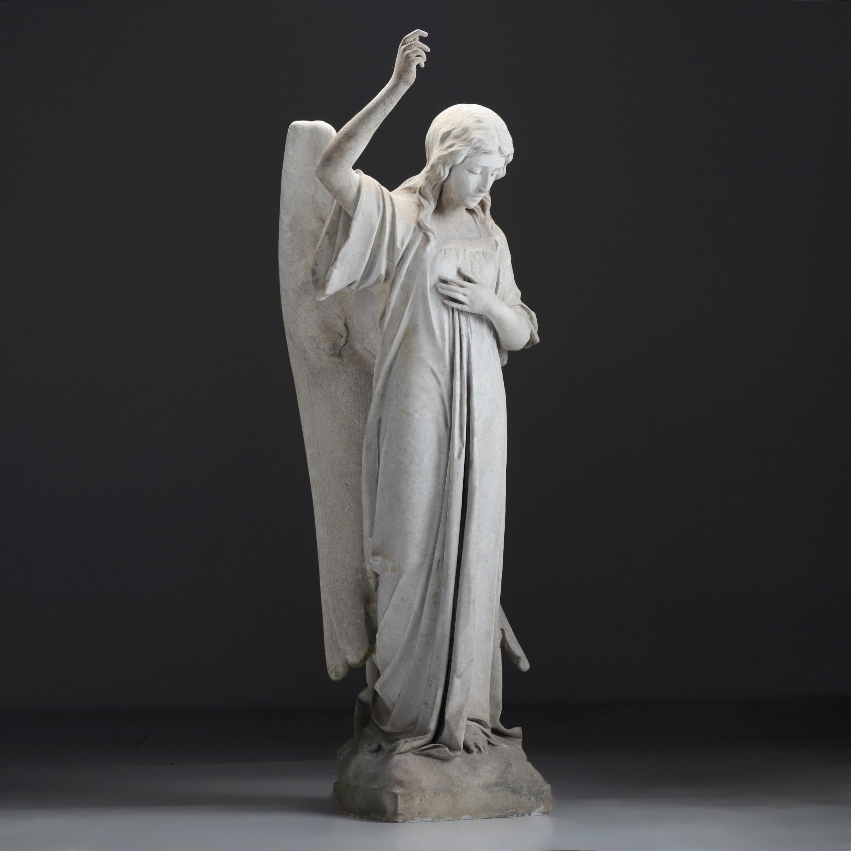 A CARVED MARBLE STATUE OF AN ANGEL, ENGLAND, Circa 1860
Originally from a church, this impressive marble statue has a certain peaceful quality, the marble is weathered to a soft, dusty pale grey colour, the whole statue has a peaceful and quite