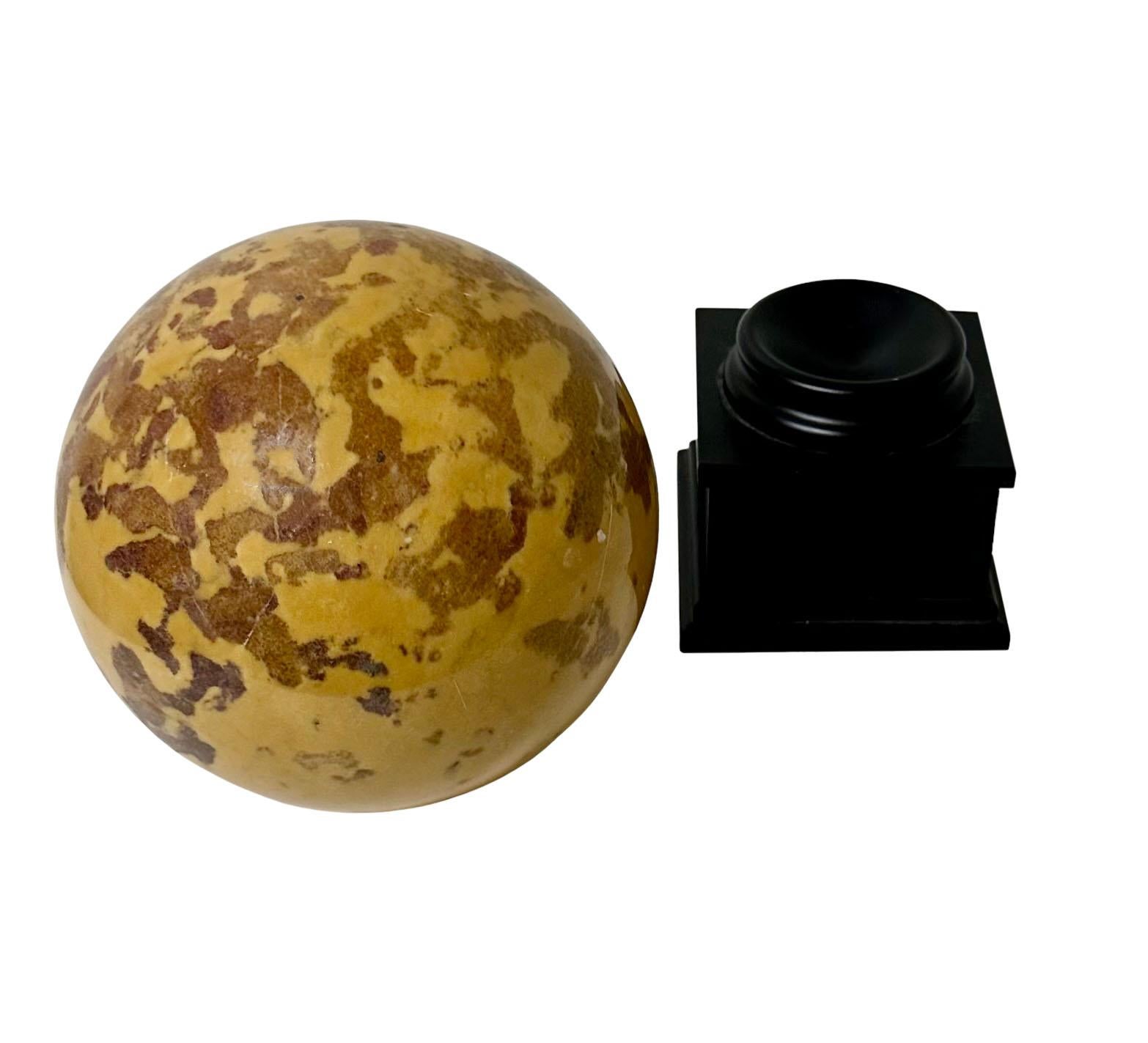 yellow marble ball