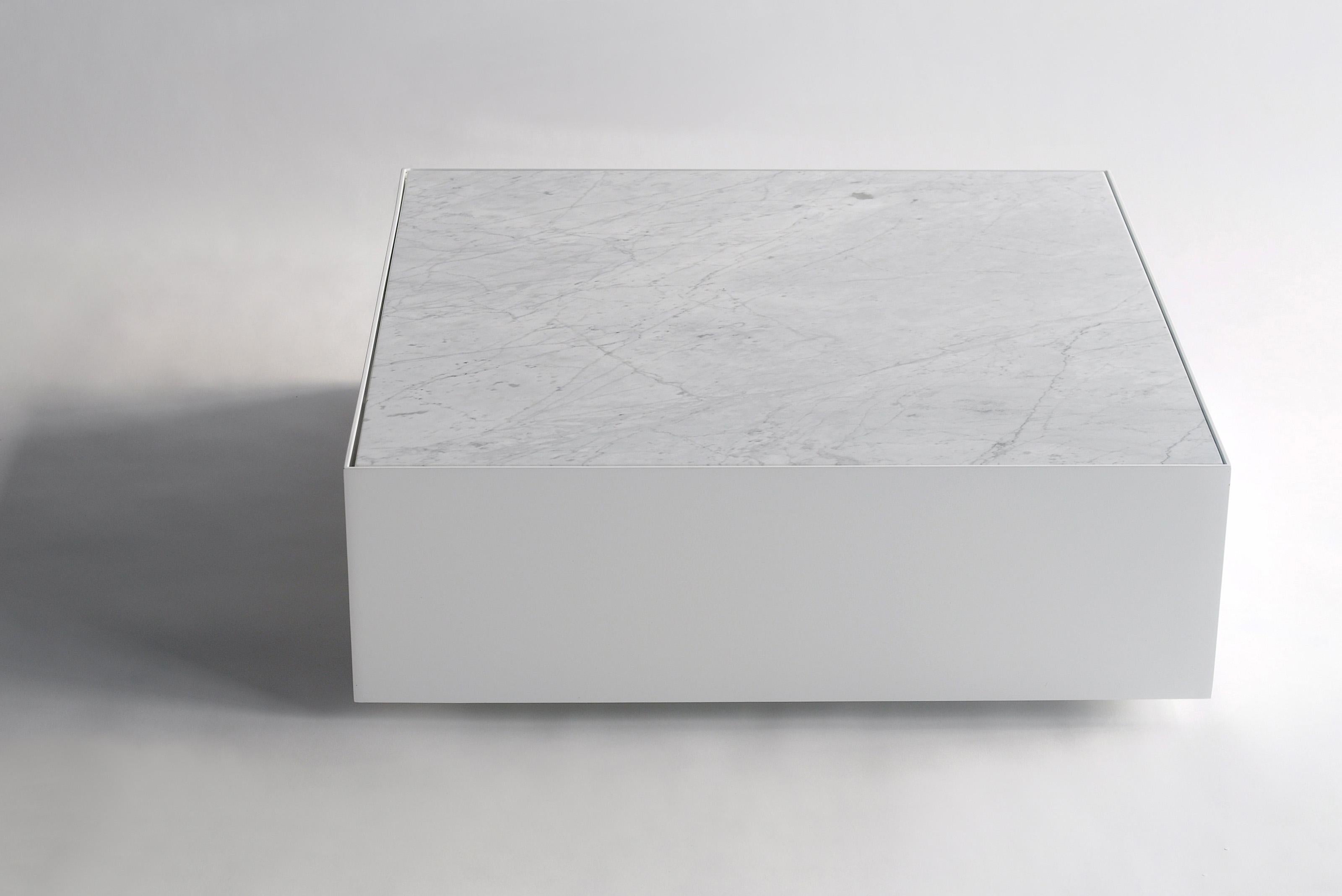 Marble Ballot Coffee Table by Phase Design
Dimensions: D 76,2 x W 76,2 x H 25,4 cm.
Materials: White marble and white powder-coated steel.

Steel coffee table with white carrara or negro marquina marble top. Available in polished chrome or powder