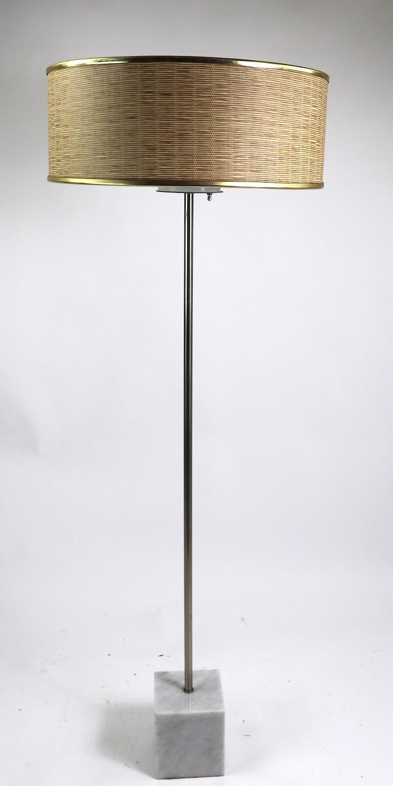 Postmodern, International style floor lamp with marble cube base, steel vertical post, and three socket top. Original, clean and working condition, shade not included. Iconic Minimalist design floor lamp by Laurel Lamp Company.