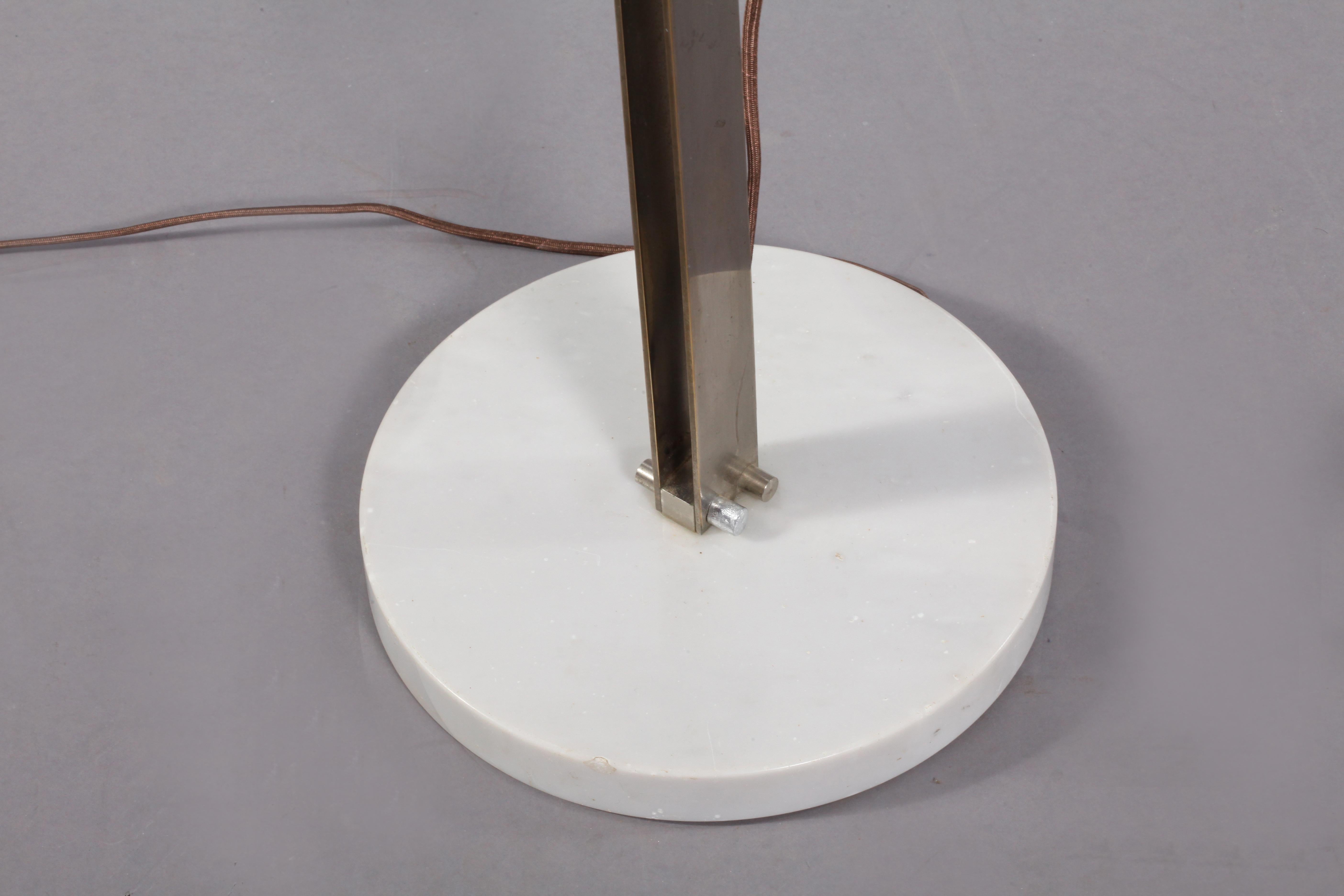 Sculptural floor lamp by Goffredo Reggiani from circa 1960. Made of satin steel, copper and white plexiglass on a marble base. European plug. 
Measures: H 151 cm x W 25 cm x D 25 cm.