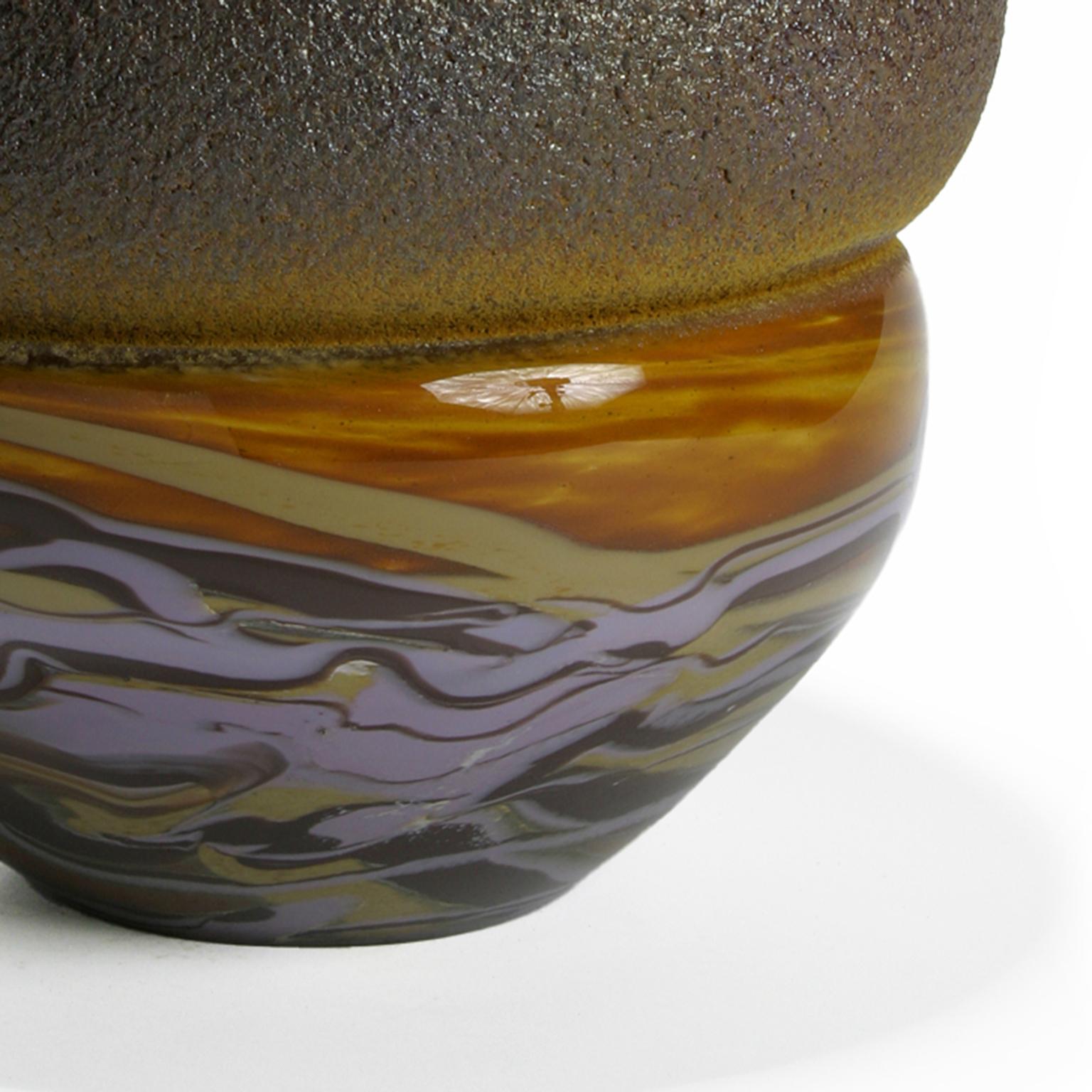 Hand blown glass object. Burnt amber glass powder applied to amber glass, while hot. Polished marble glass attached to the burnt powdered glass also while hot. Made in Amsterdam - Netherlands.