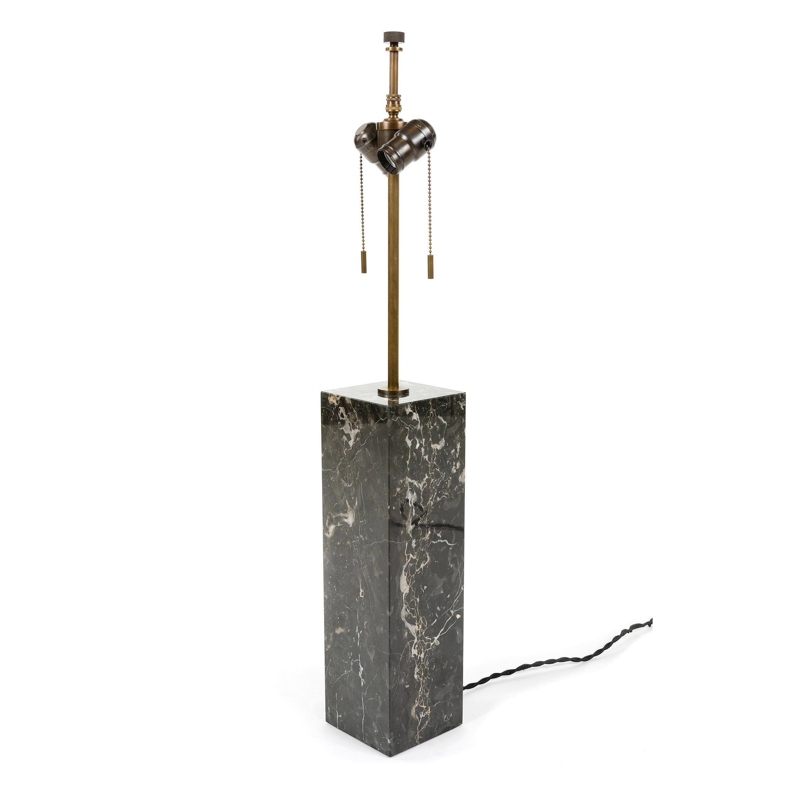 Rectangular black marble table lamp with patinated brass hardware. Marble base height 16 inches.