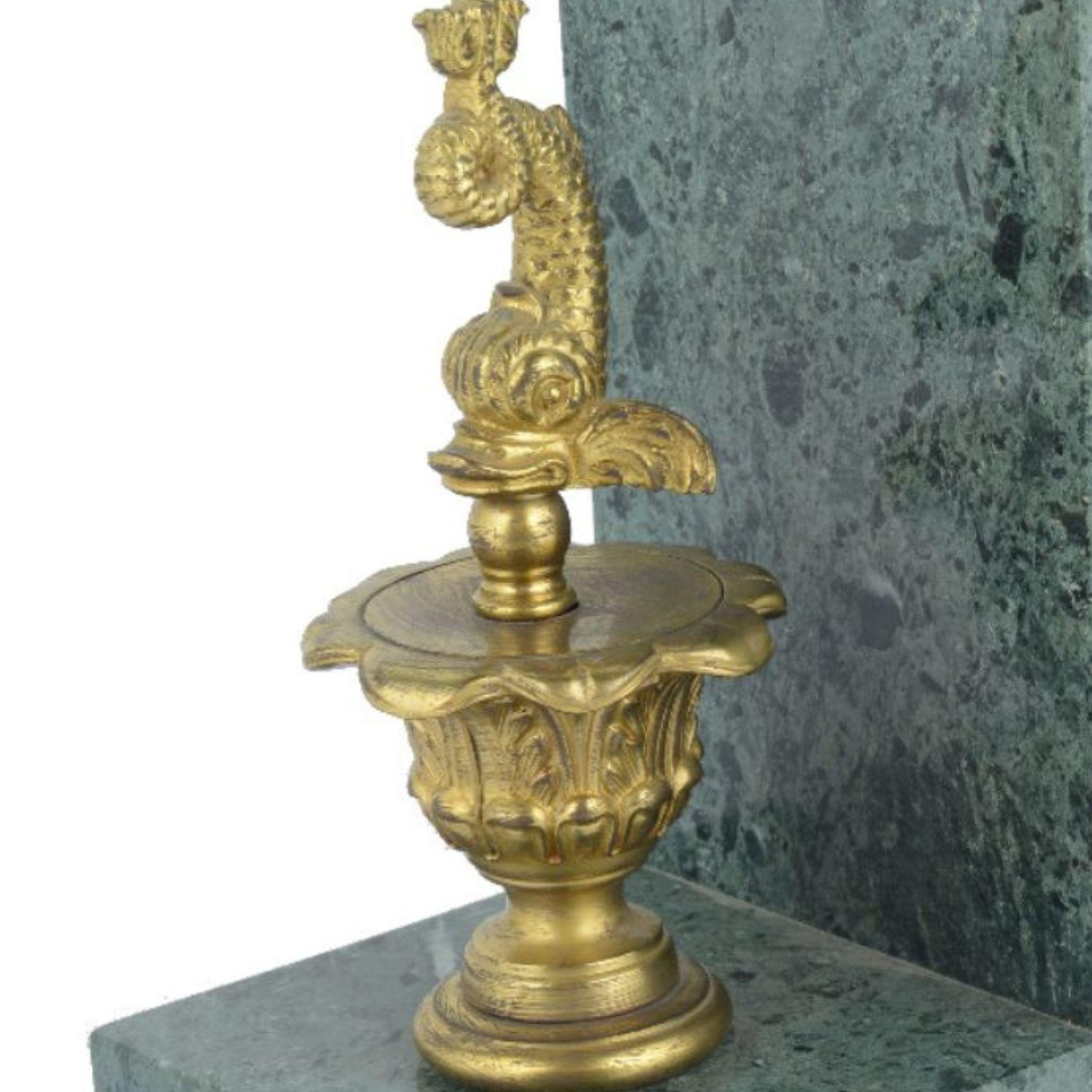 Contemporary Belle marble bookend with brass dolphins For Sale