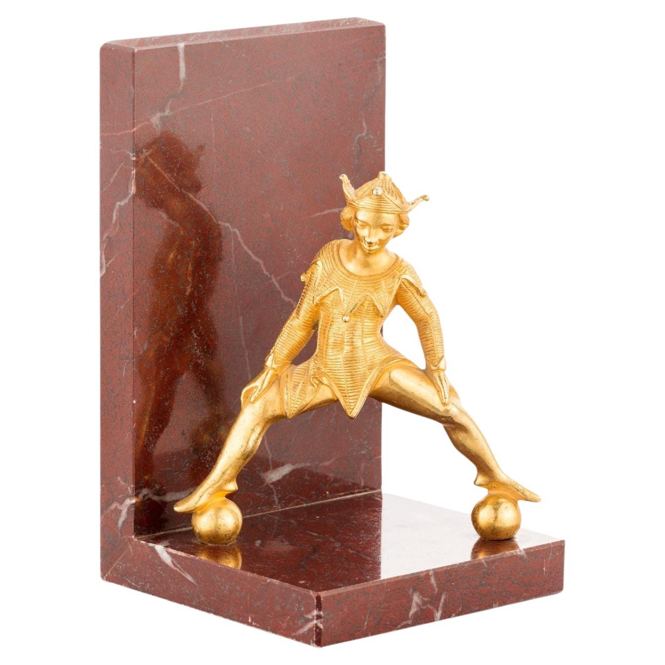 Belle marble bookend with brass jester For Sale