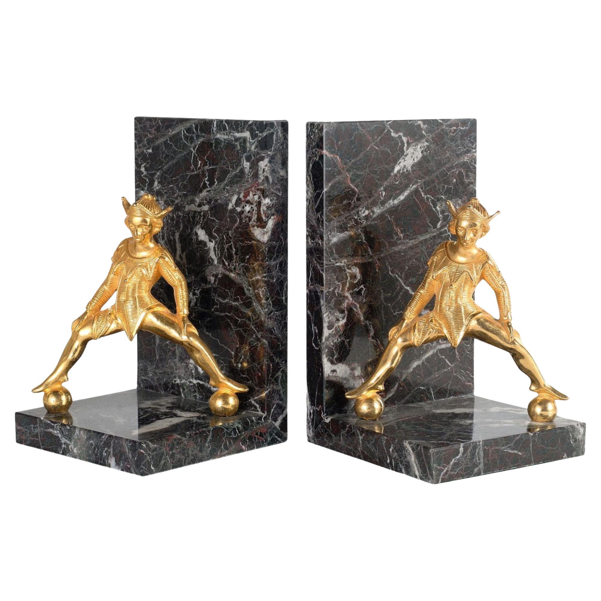 Belle marble bookend with brass jester For Sale