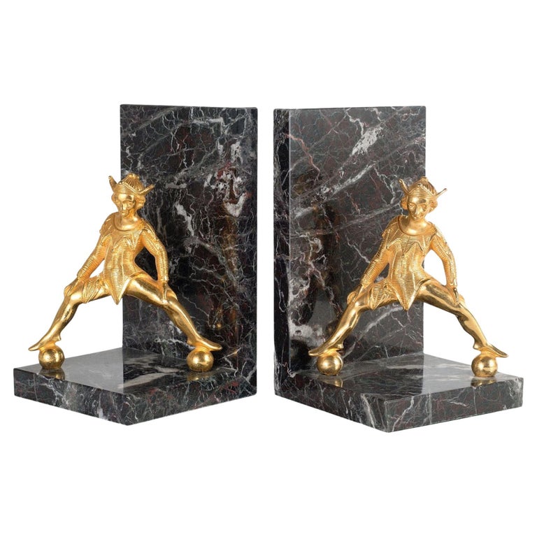 Belle marble bookend with brass jester For Sale at 1stDibs