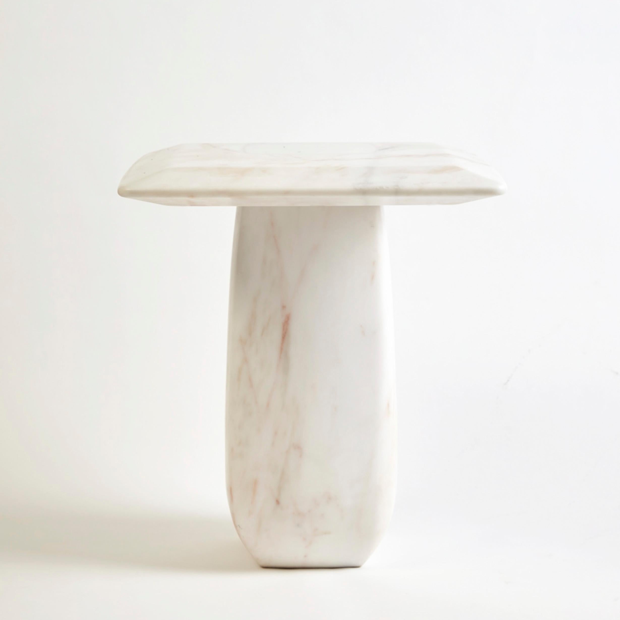 Marble Bossa Side Table by DUISTT 
Dimensions: W 40 x D 40 x H 47 cm
Materials: Estremoz Marble

The Bossa marble side table, crafted with great attention to details, is inspired by the subtlety, particular charm and harmonious simplicity of the