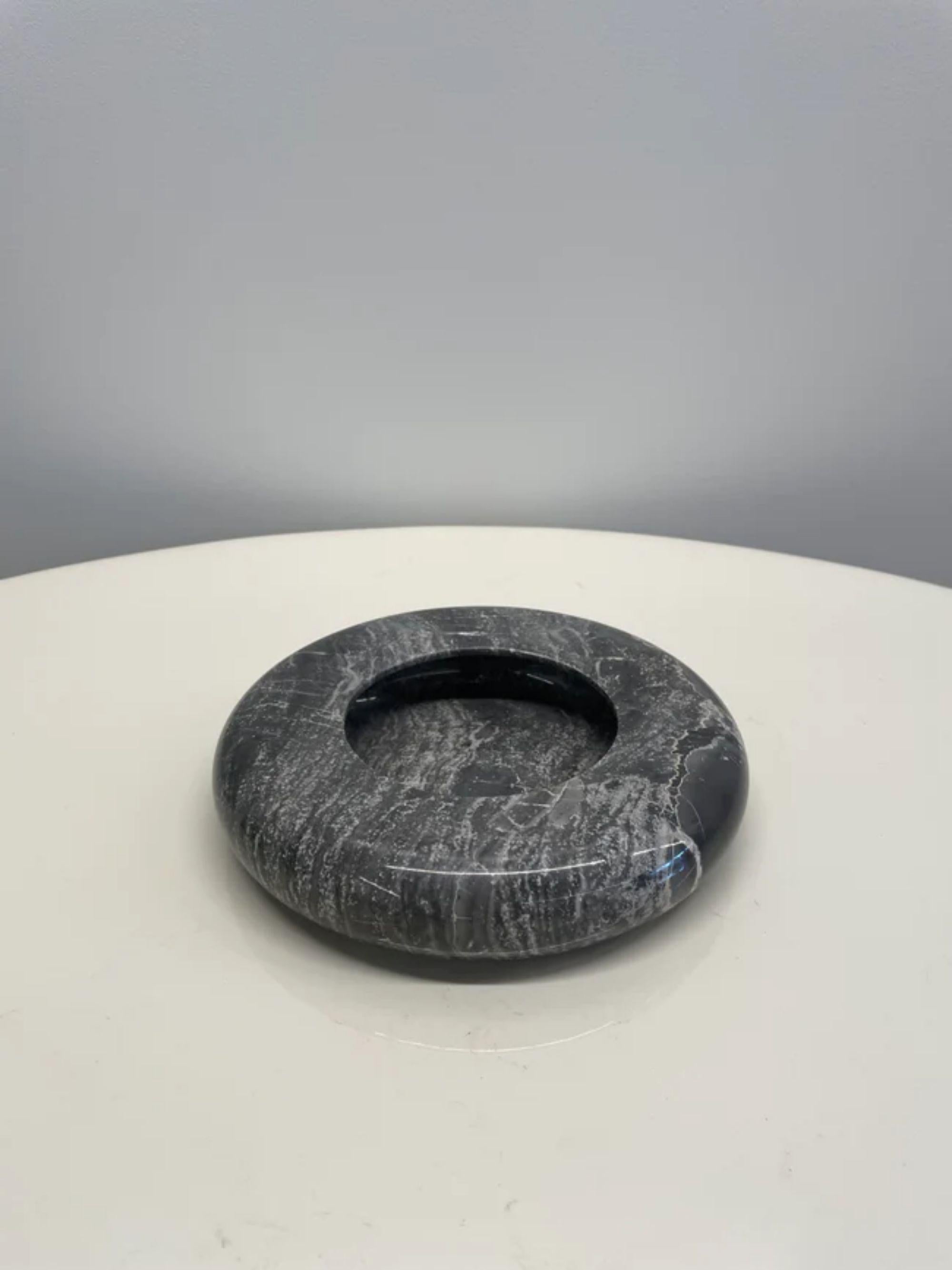 Egidio Di Rosa and Pier Alessandro Giusti marble bowl for UP & UP, Italy, 1960s

Additional Information:
Materials: Marble
Dimensions: 1 1/2” H x 7 3/4” Dia.
Condition: Excellent. Retains original stickers.