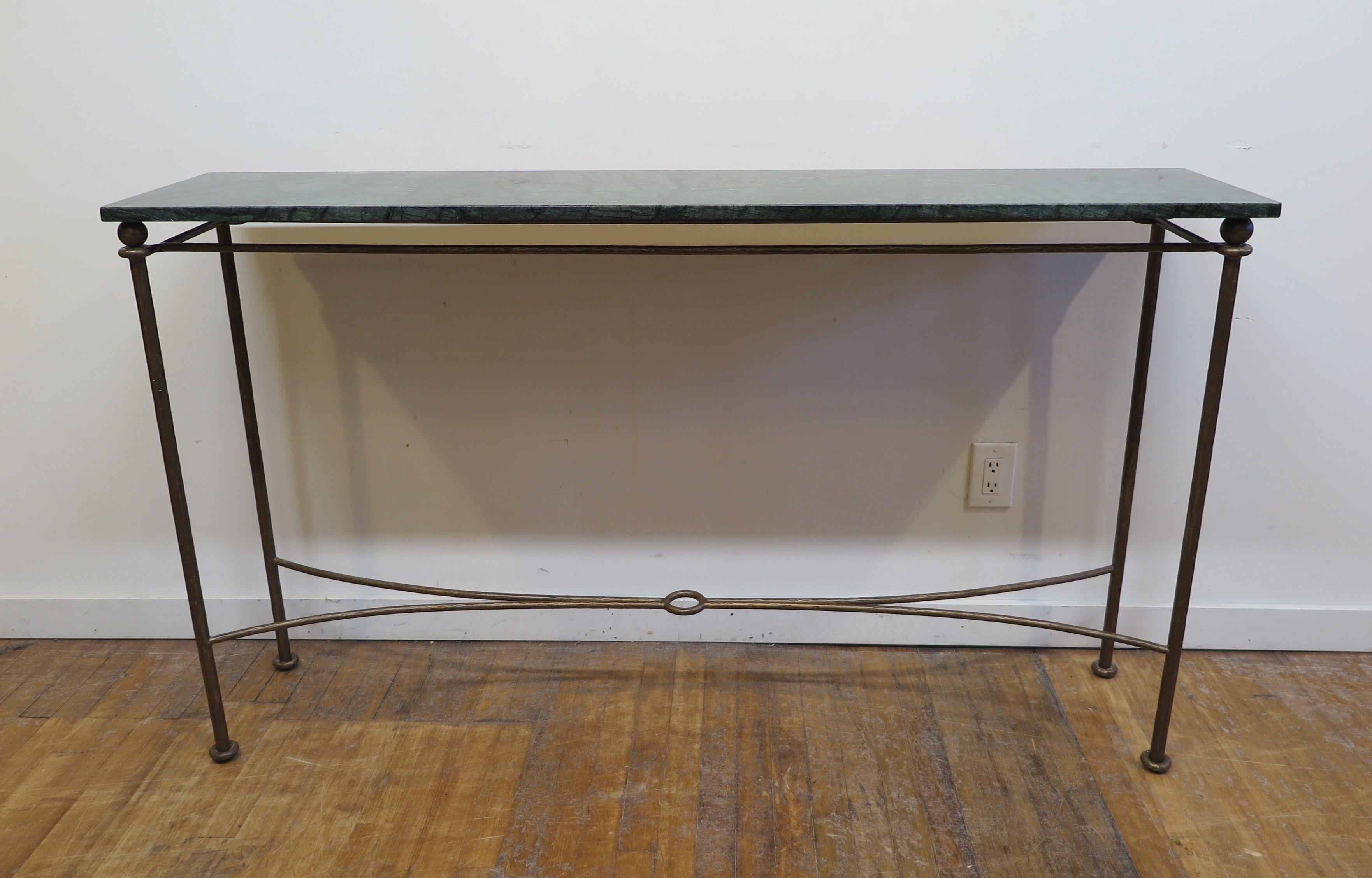 Marble Top Console Table in Art Deco style. Beautiful green marble with extraordinary veining set on bronzed metal frame legs with interesting circle detail to the struts. The bronzed frame has a hand hammered effect to the metal adding a nice