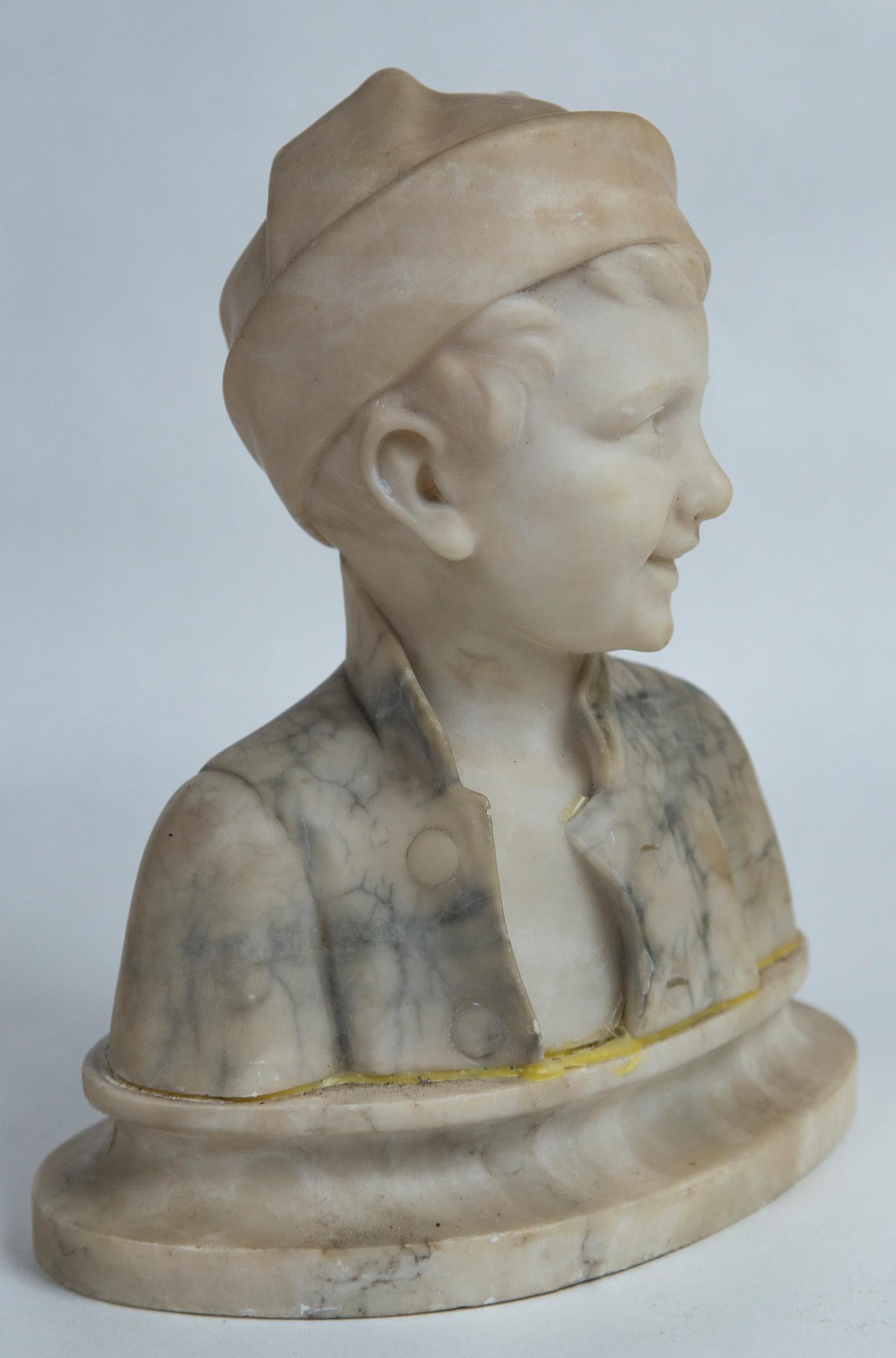 Marble Bust of a Boy with a Cap In Good Condition For Sale In Woodbury, CT