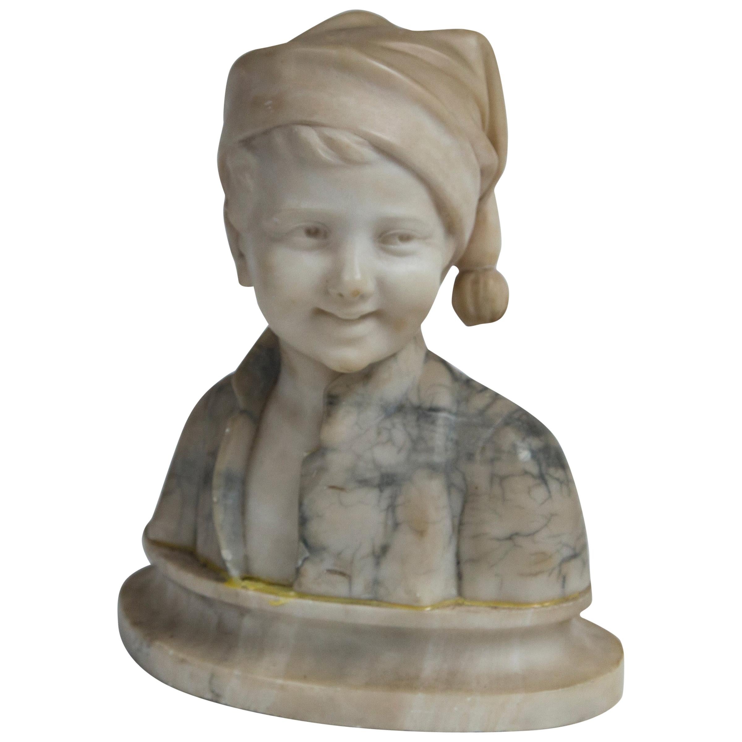 Marble Bust of a Boy with a Cap For Sale