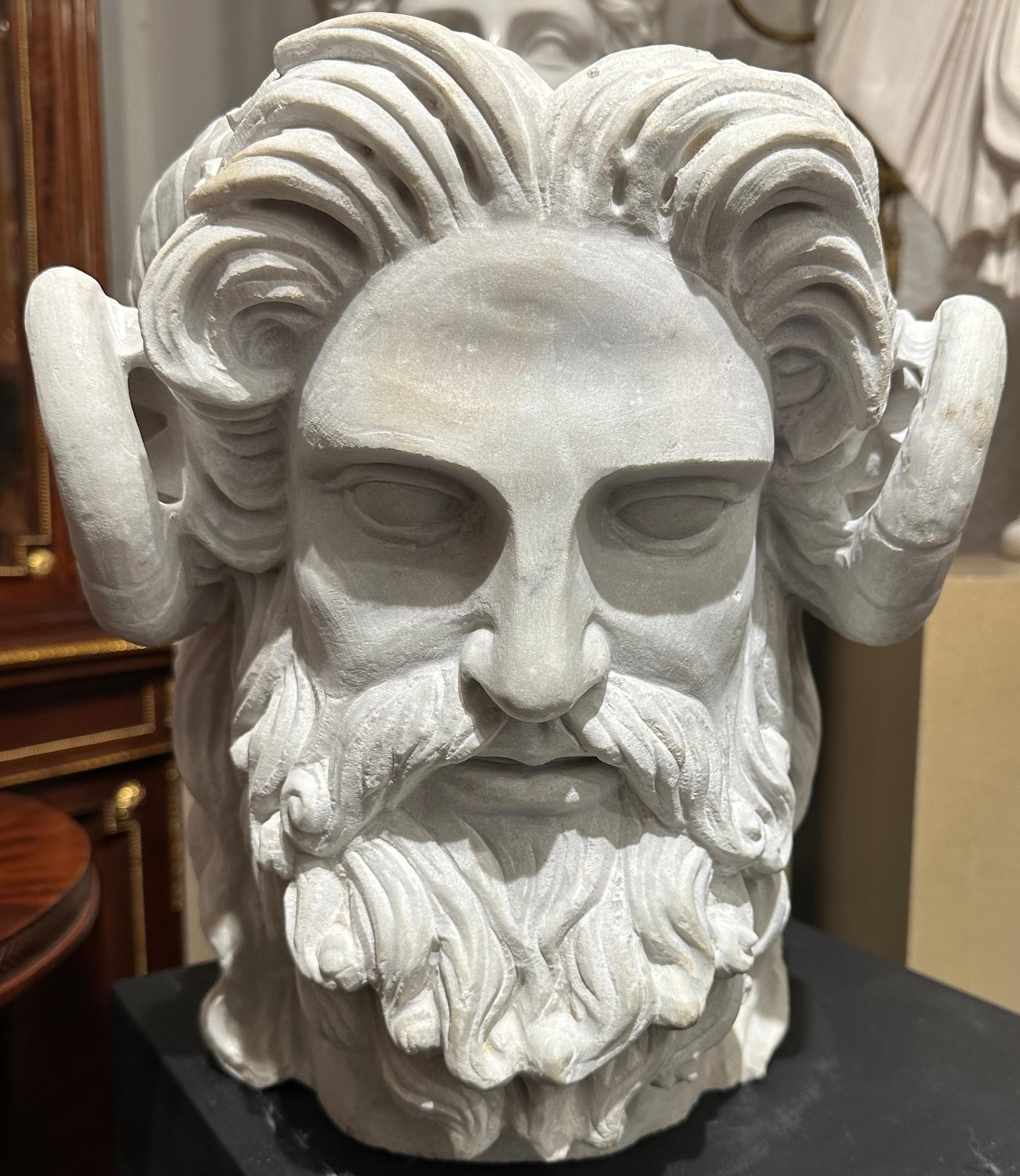 A detailed and beautifully carved marble bust of the Roman God Janus. The God of beginnings, endings, time, duality and boundaries, the openings of doorways, gates and passages. The two faces portray this duality. They are both expressively carved