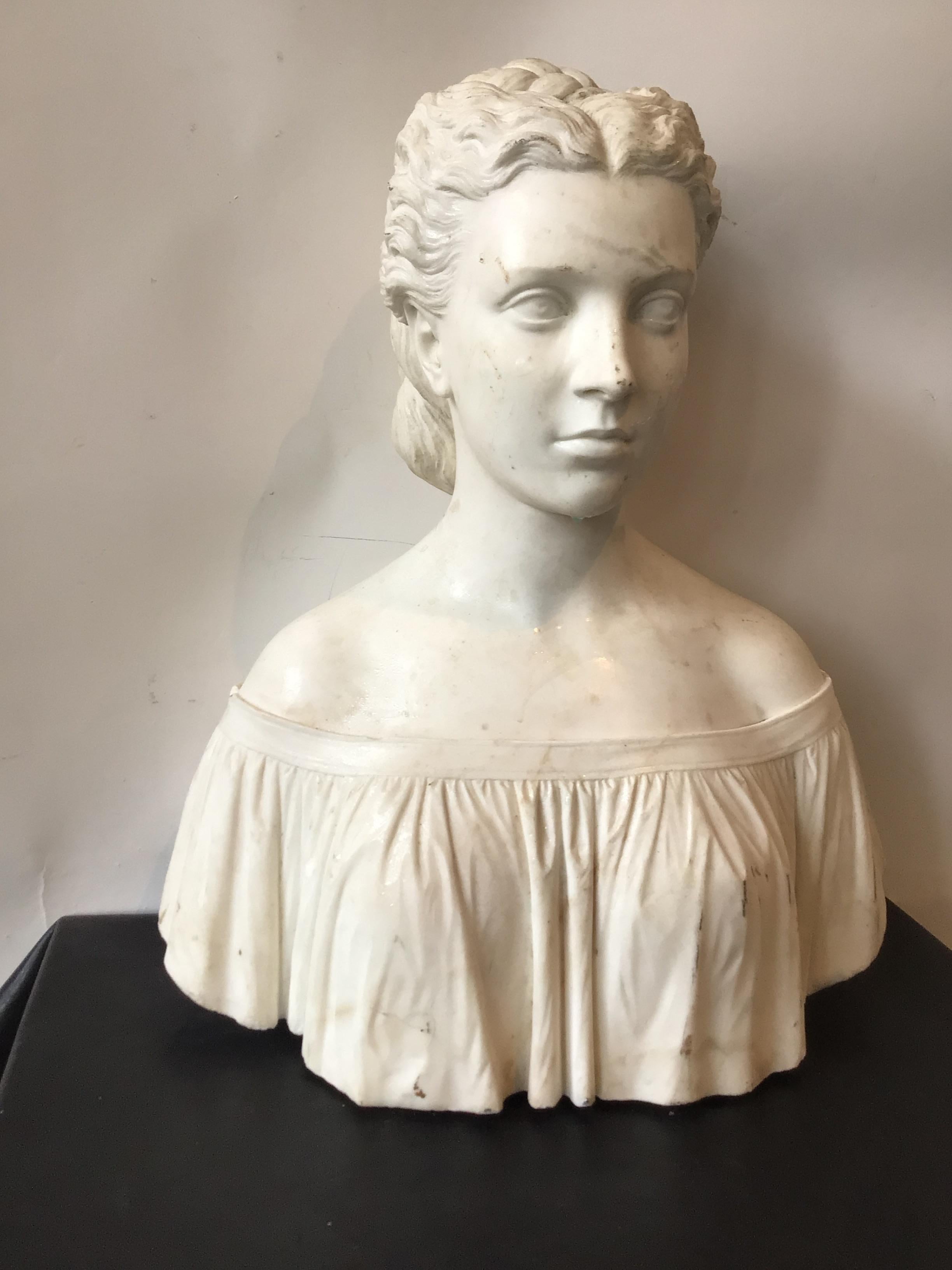 1870s Italian carved marble bust of a woman byPietro Bazzanti. Signed on back.
Sculpture needs a base, it does not sit flat.