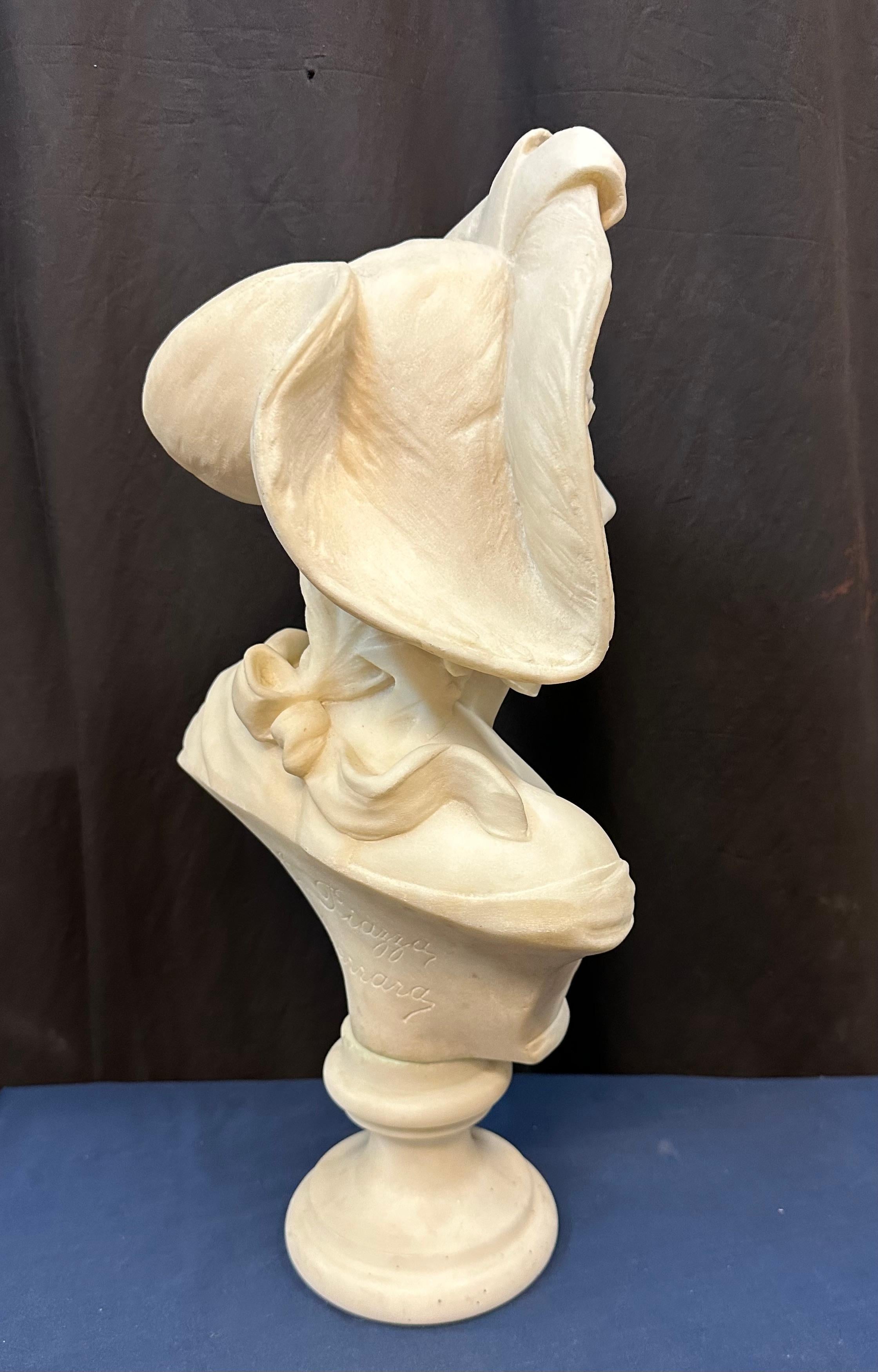 19th Century marble bust of woman wearing a hat For Sale