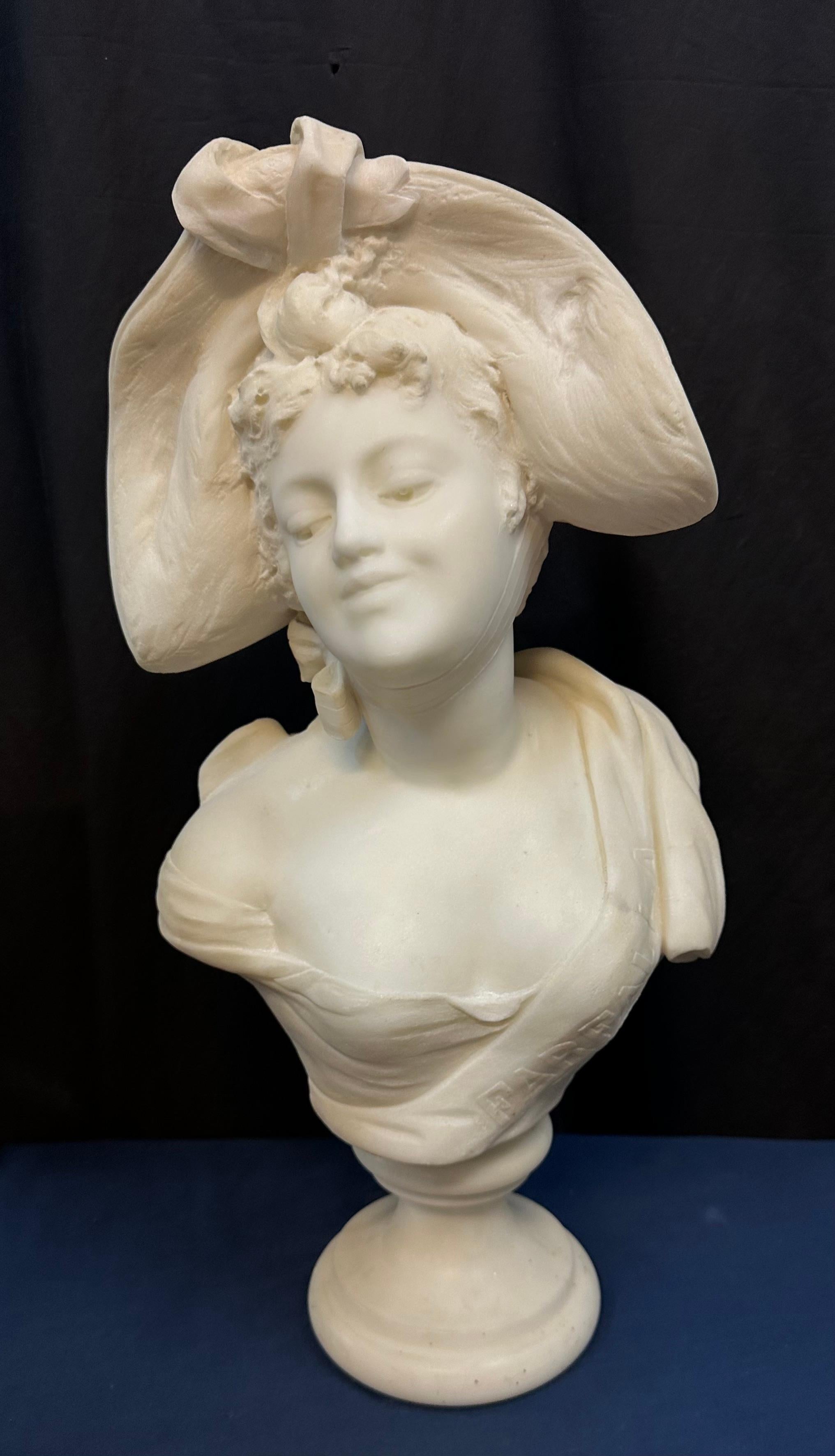 marble bust of woman wearing a hat For Sale 1