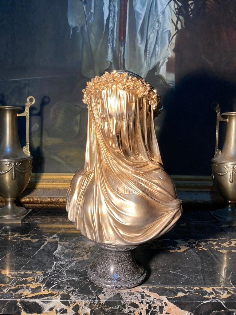 marble statue veiled woman