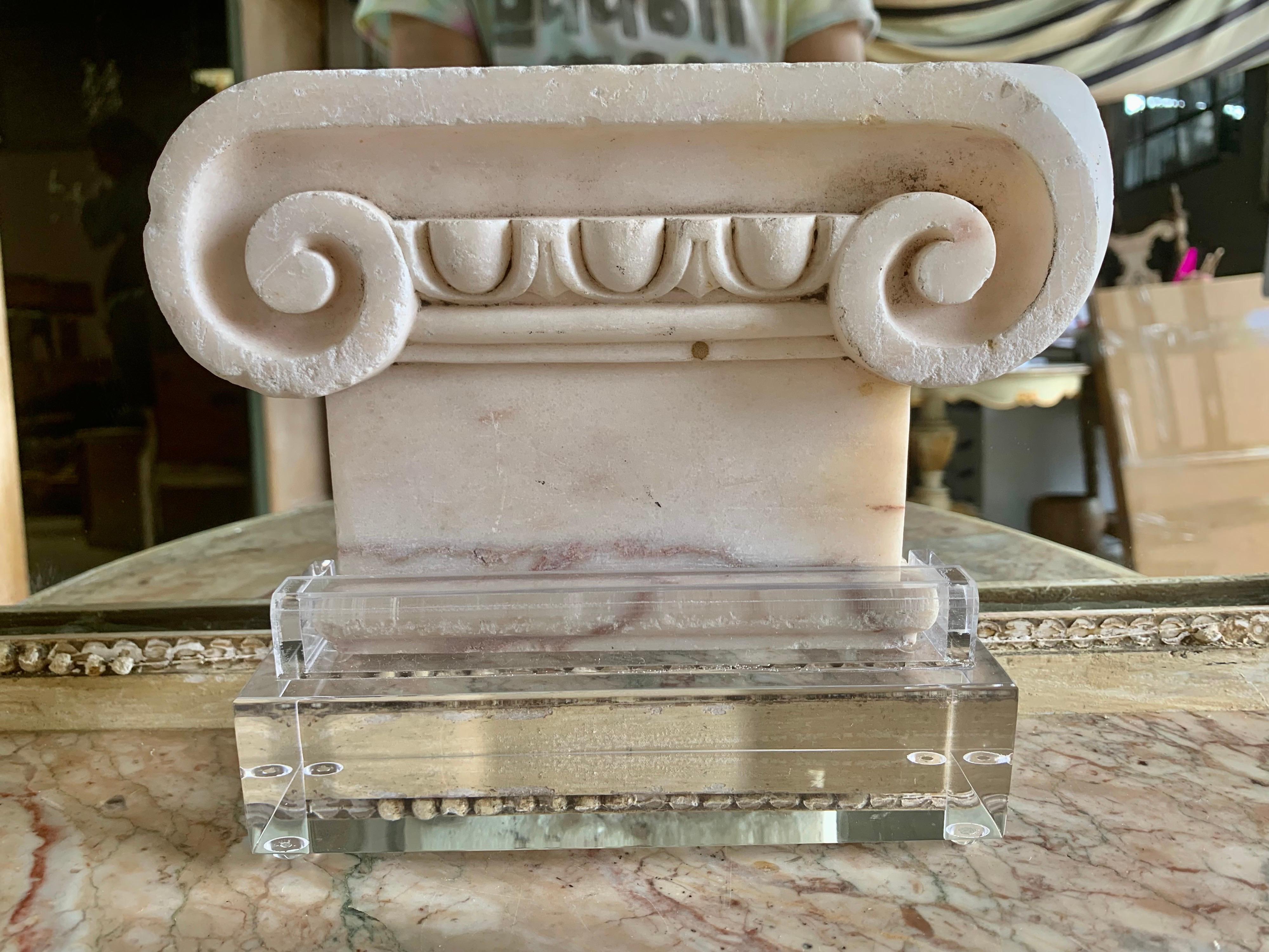 19th century carved marble Capital displayed on a lucite base. I purchased the Capital in Italy but it was made in France.