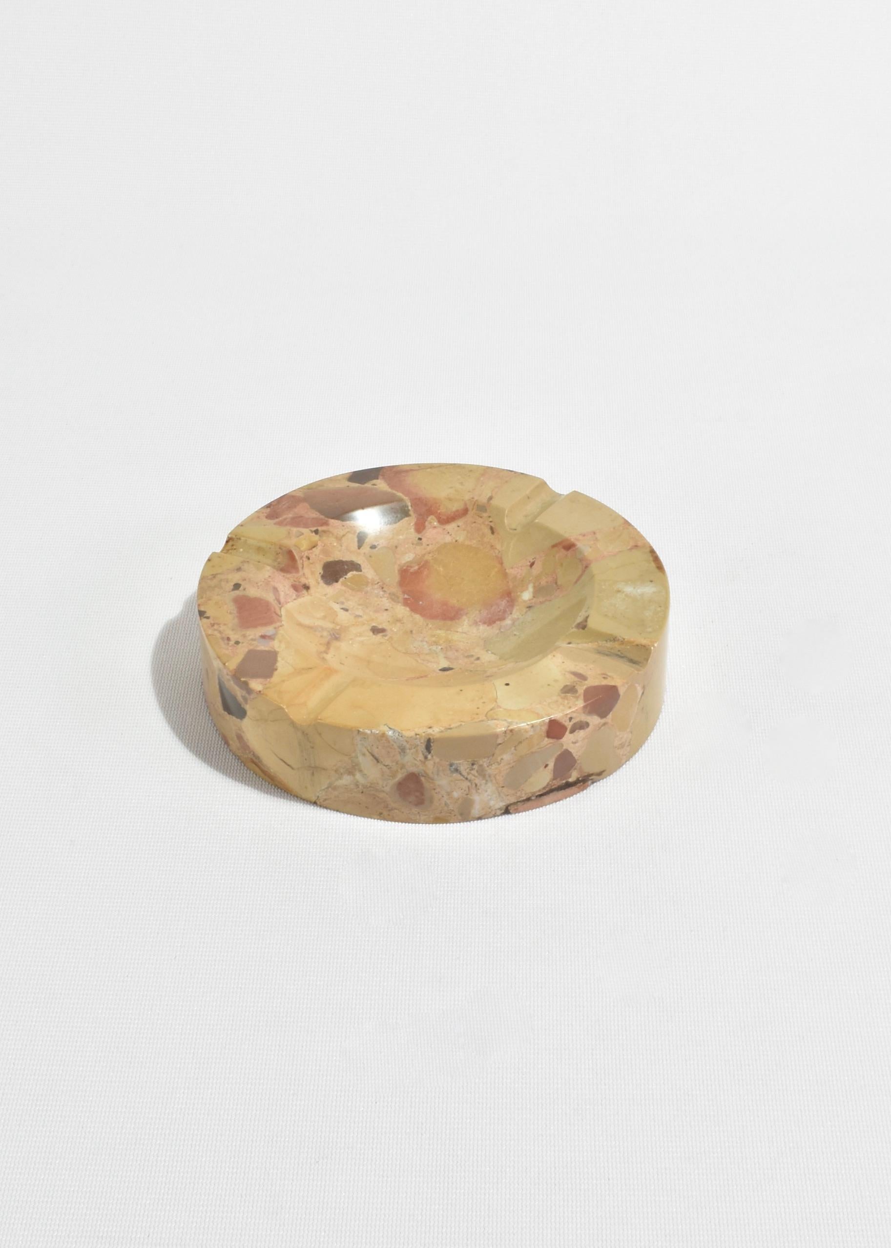 Beautiful marble catchall or ashtray in beige with spotted detail. Perfect for jewelry keeping, part of a table scape or a catchall for small treasures. Ca. 1970s.