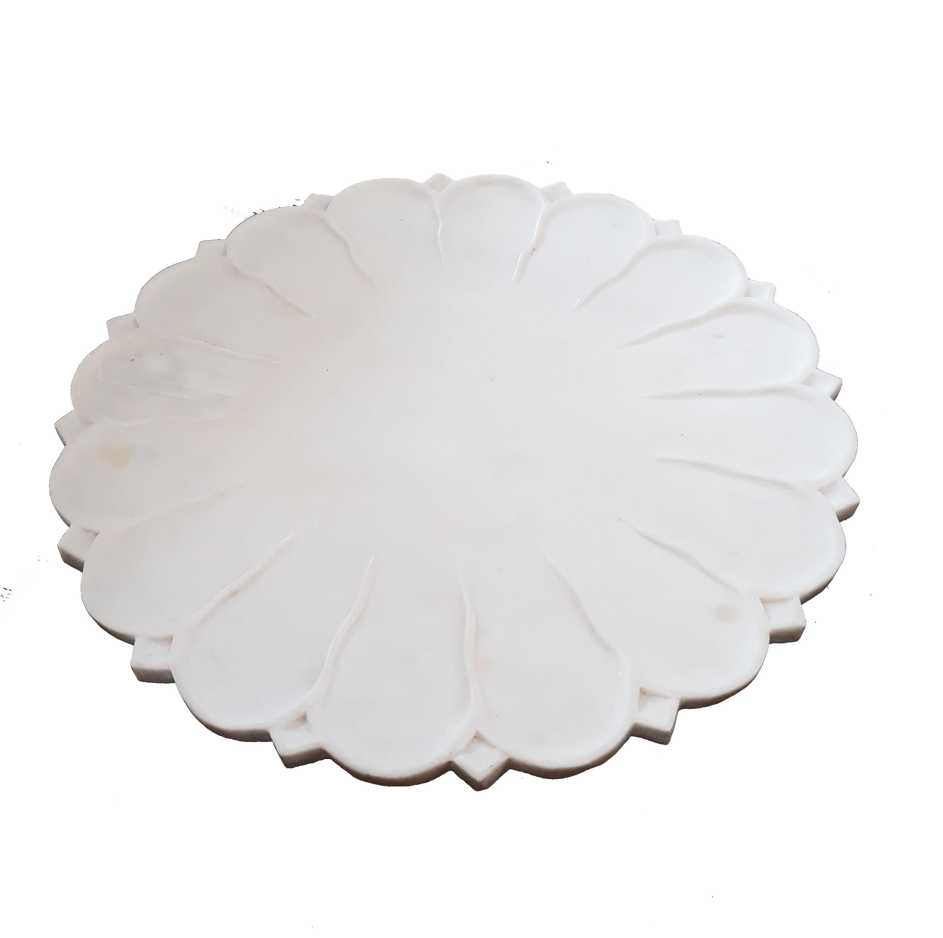 A hand-carved marble platter, server or charger from India. 18 inches diameter. Two available.