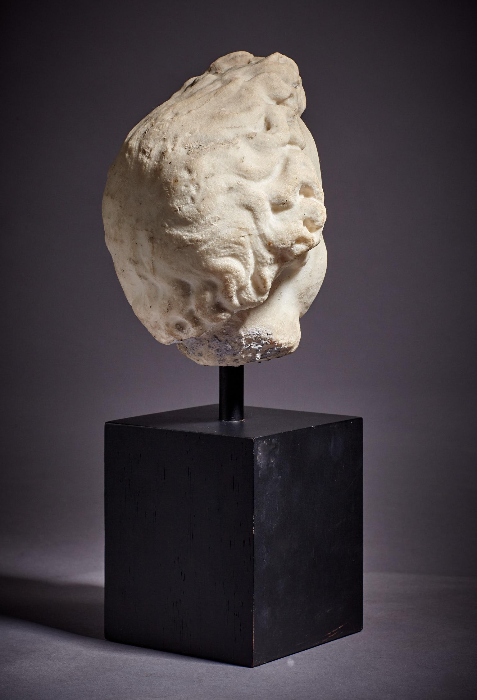 Carrara Marble Marble Cherub Head, Late 16th-Early 17th Century, Italian, circa 1600-1620 For Sale