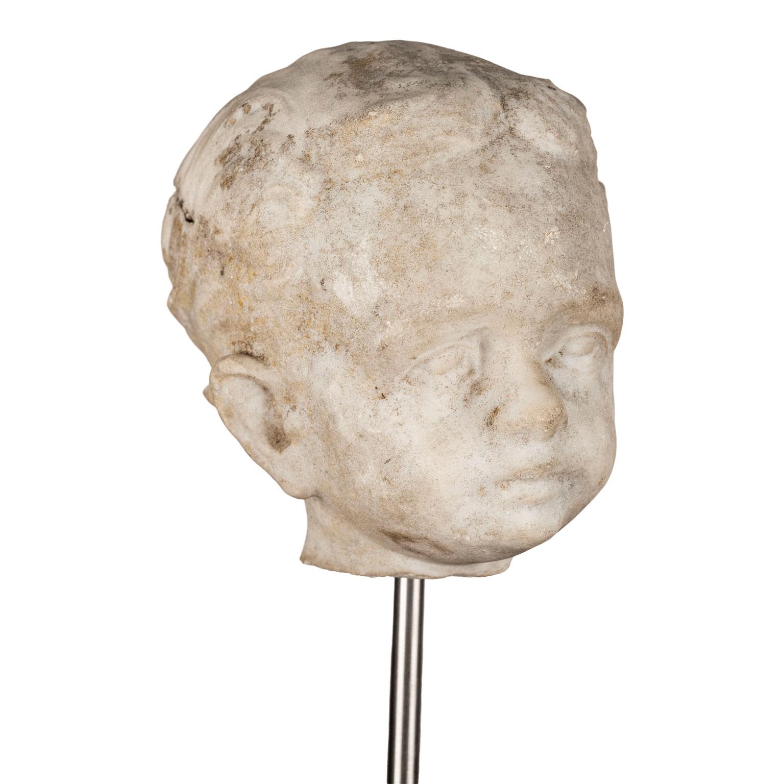 Marble child's head sculpture: 18th century fragment from Italy.