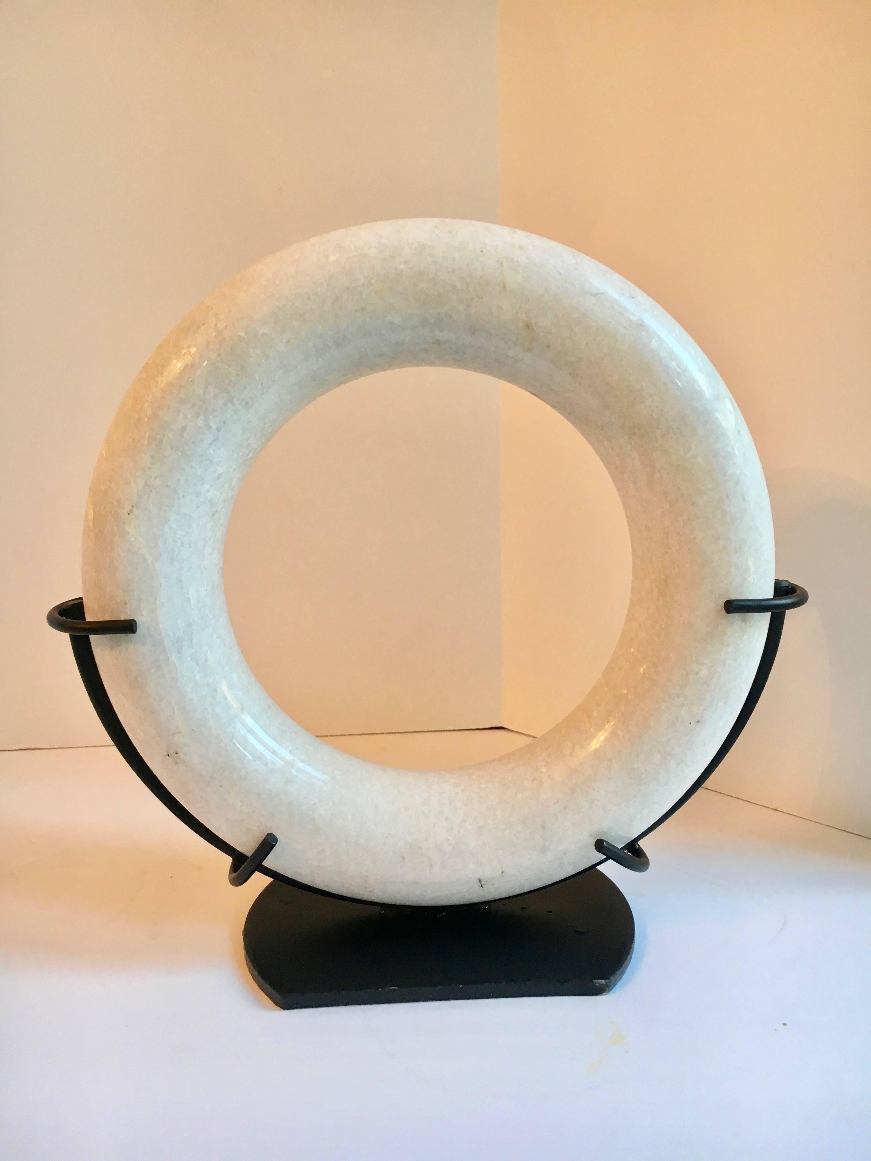 Marble circular disk sculpture in custom metal stand - a custom piece perfect for any room or shelf.
 