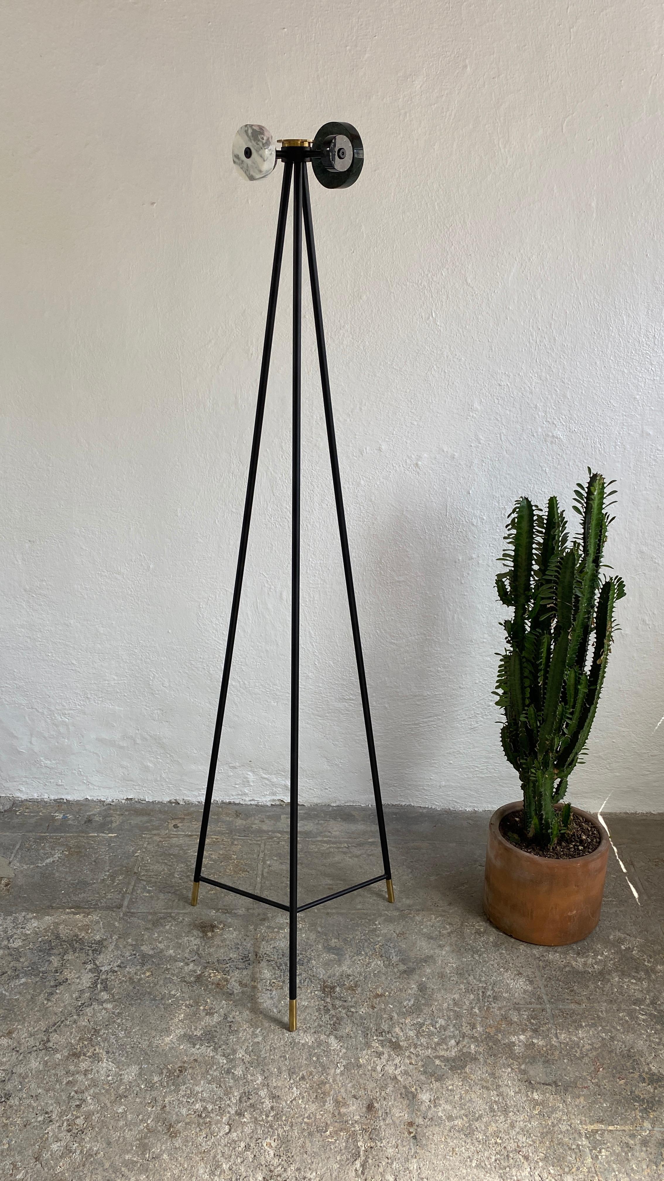 Marble coat stand by Comité de Proyectos
Dimensions: 40 x 40 x 145cm
Materials: Marble, metal, brass details

The hooks of this coat rack are made from leftover marble slabs that we collected from our marble worker's workshop. The body is made