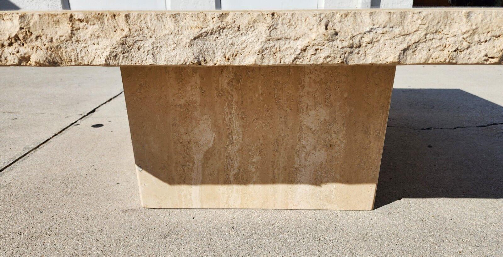 For FULL item description click on CONTINUE READING at the bottom of this page.

Offering one of our recent palm beach estate fine furniture acquisitions of a
1970s Italian live edge polished travertine coffee cocktail table by STONE