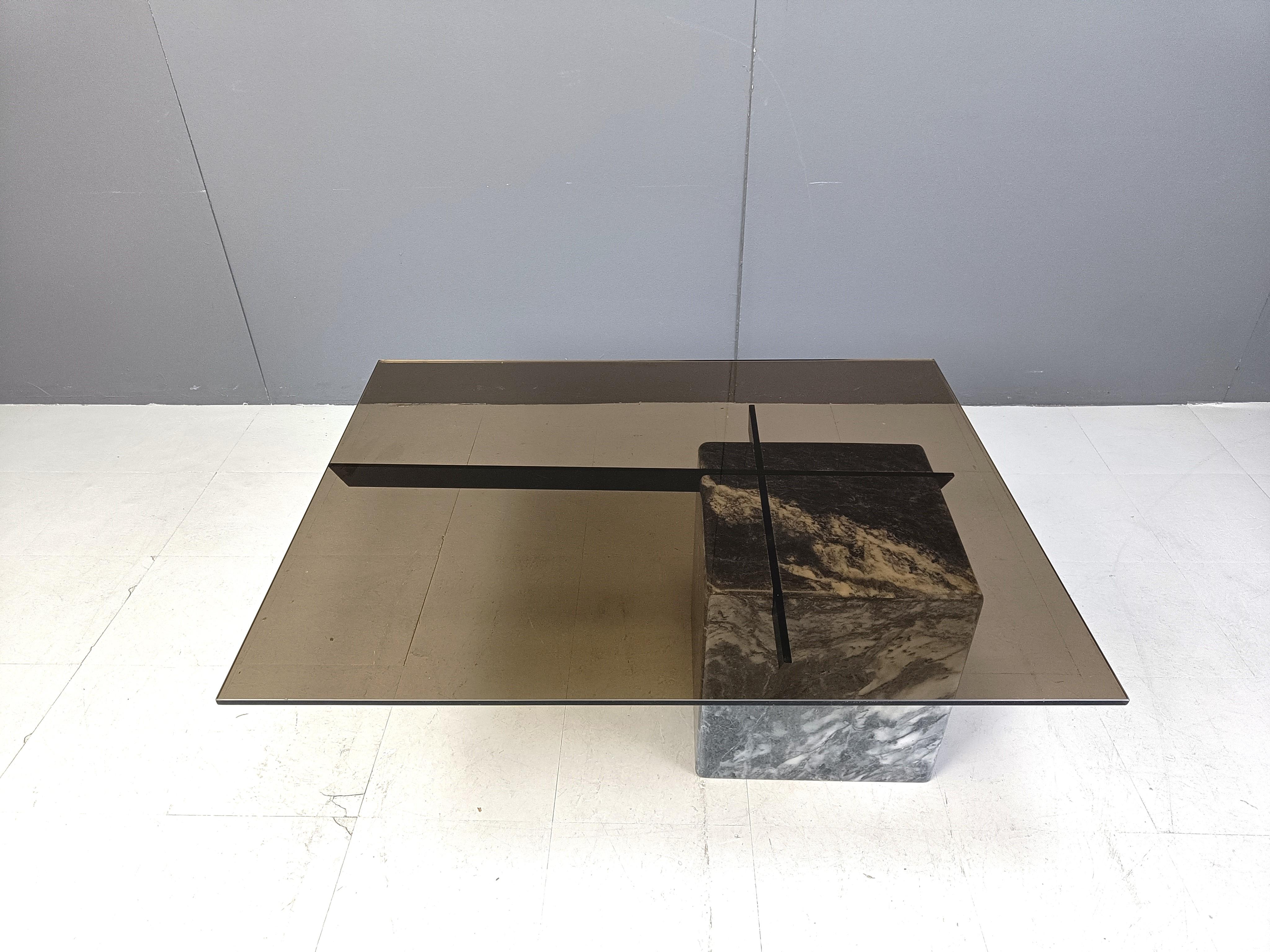 Vintage marble coffee table by Artedi.

Comes with a smoked glass top.

Good condition.

This style can be mixed in lots of interiors.

1980s - Italy

Very good condition

Dimensions
Height: 41cm
Width: 107cm
Depth: 82cm

Ref.: 748621