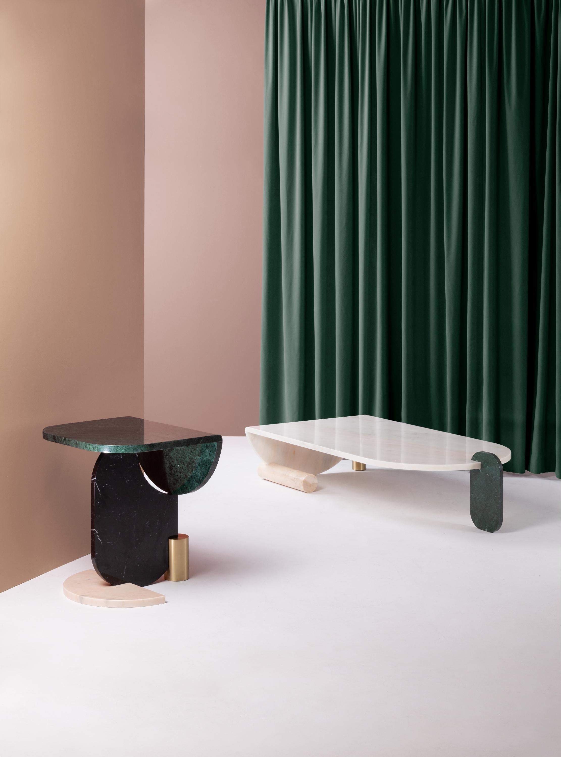 Marble coffee table by Dooq
Measures: W 168 cm 71”
D 80 cm 32”
H 32 cm 13”

Materials: Top marble: Guatemala green, estremoz white,
estremoz rose, Carrara
side and cilindric base marble: Guatemala green,
estremoz white, estremoz rose, Nero