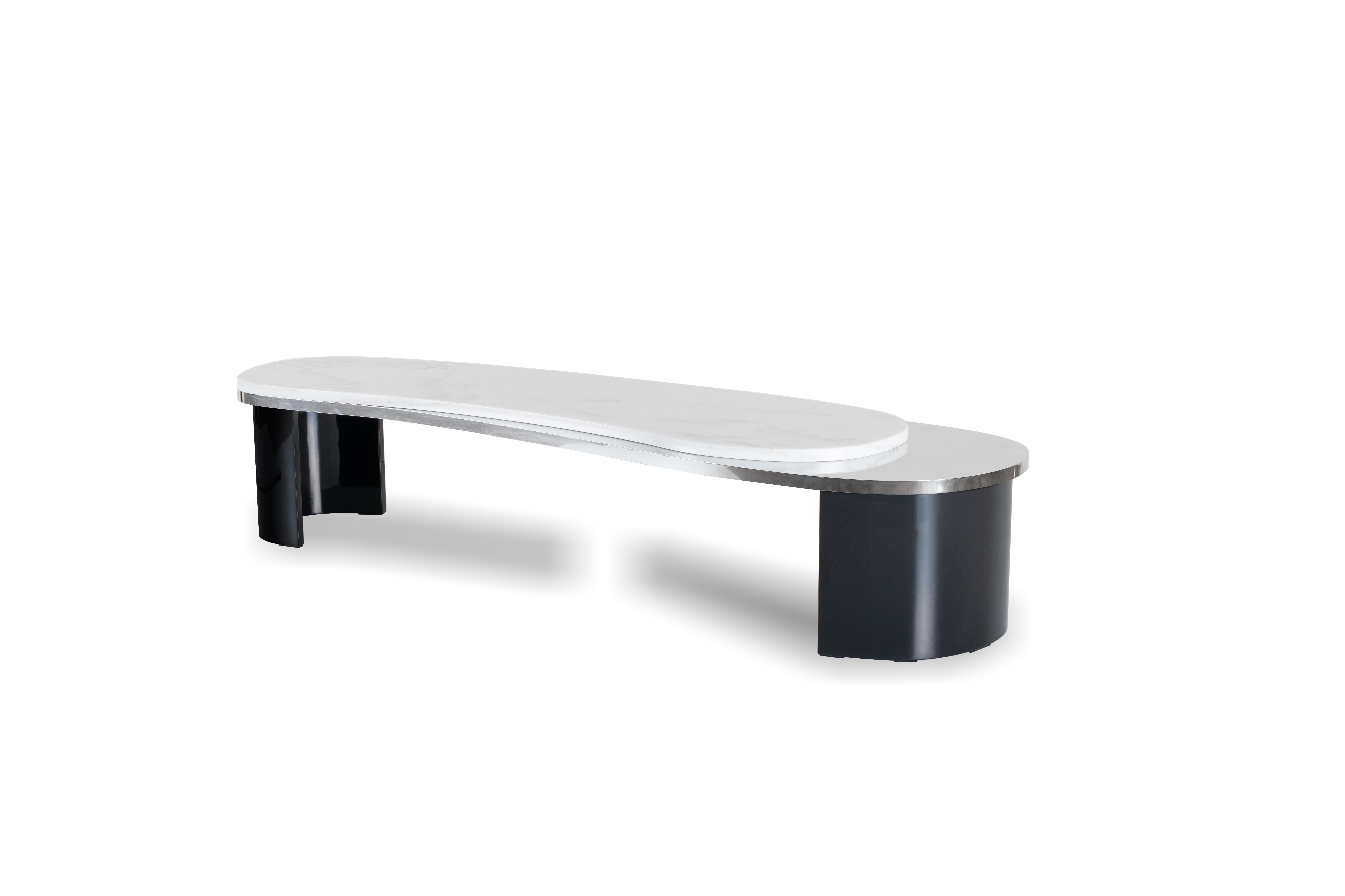 Marble coffee table by Green Apple
Dimensions: H 30 x W 150 x D 46 cm
Materials: Black lacquer; high-gloss finish
Polished stainless steel
Calacatta Bianco marble; polished

Wooden coffee table with top in polished stainless steel and polished