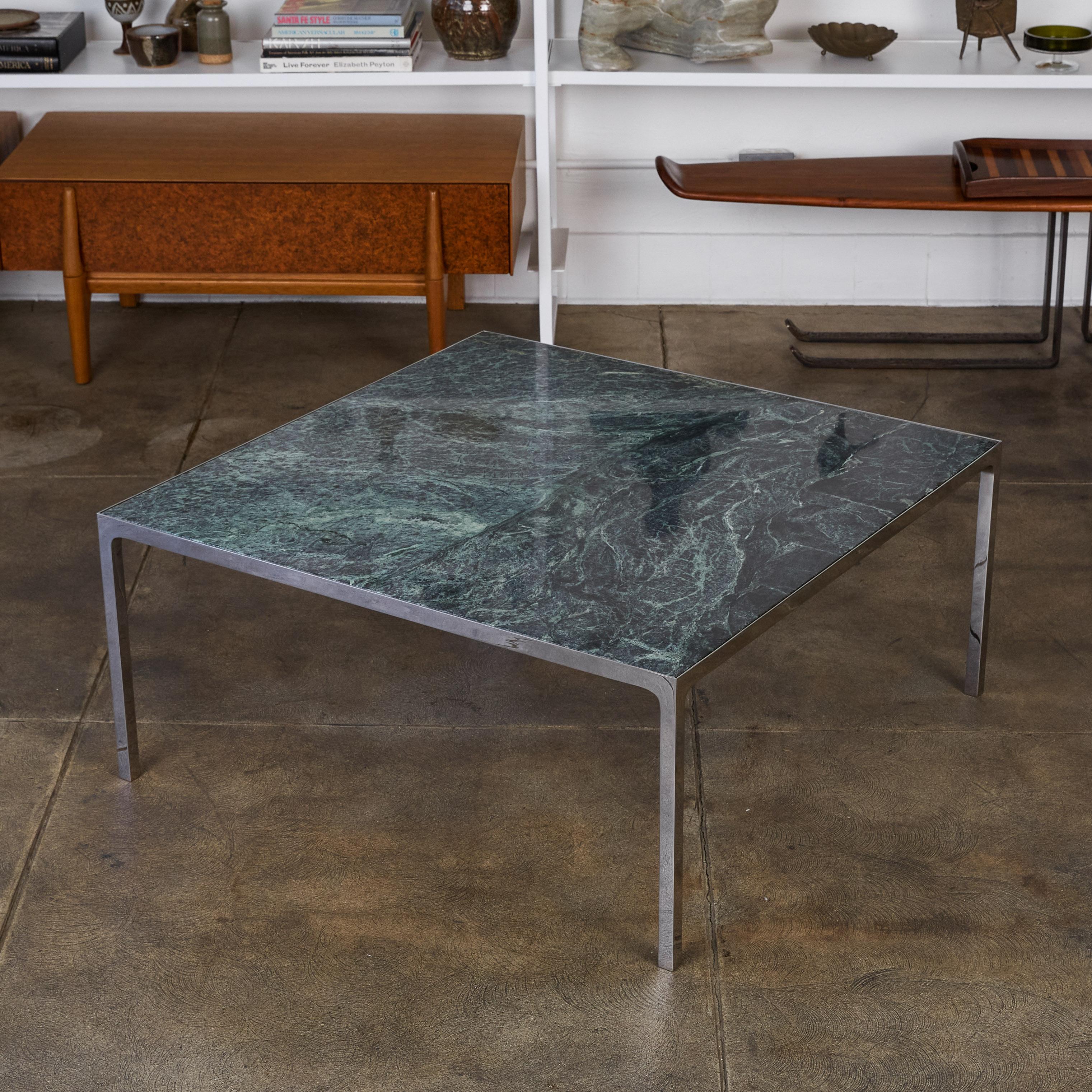 Polished stainless steel coffee table with green marble top by Nicos Zographos from the 1960s. Italian marble is inset into the clean Minimalist steel frame. 

Condition: Excellent vintage condition; frame has been polished.

Dimensions: 36” width x