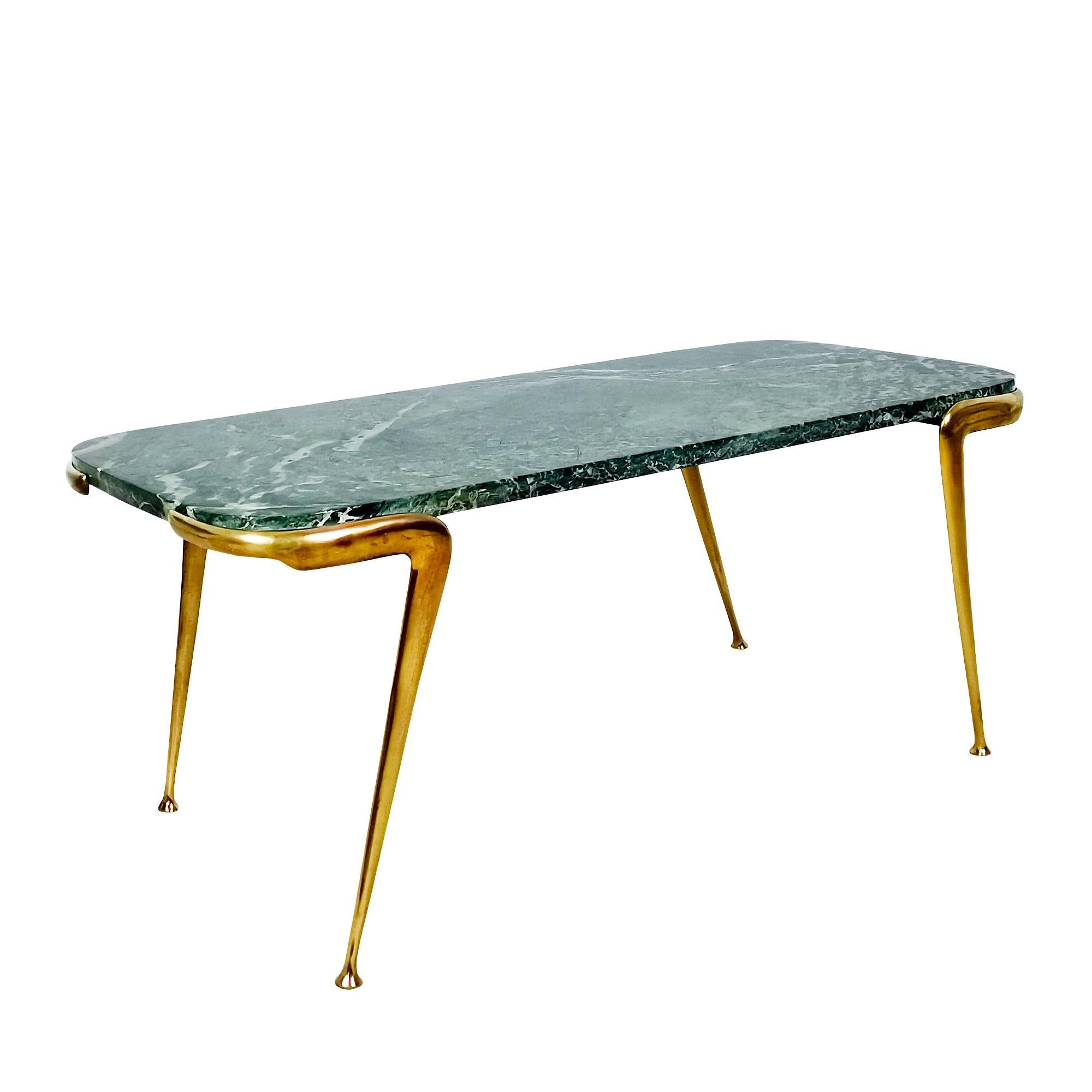 Coffee table with base in polished solid brass and steel tubes, top in celadon green veined marble.

Italy c.1940-45.