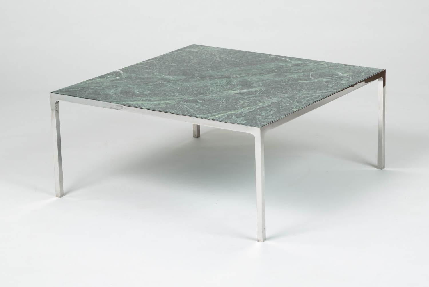 Polished stainless steel coffee table with green marble top by Nicos Zographos from the 1960s. The Italian marble is inset into the clean minimalist steel frame. We have a pair available and they are priced individually. When placed next to each