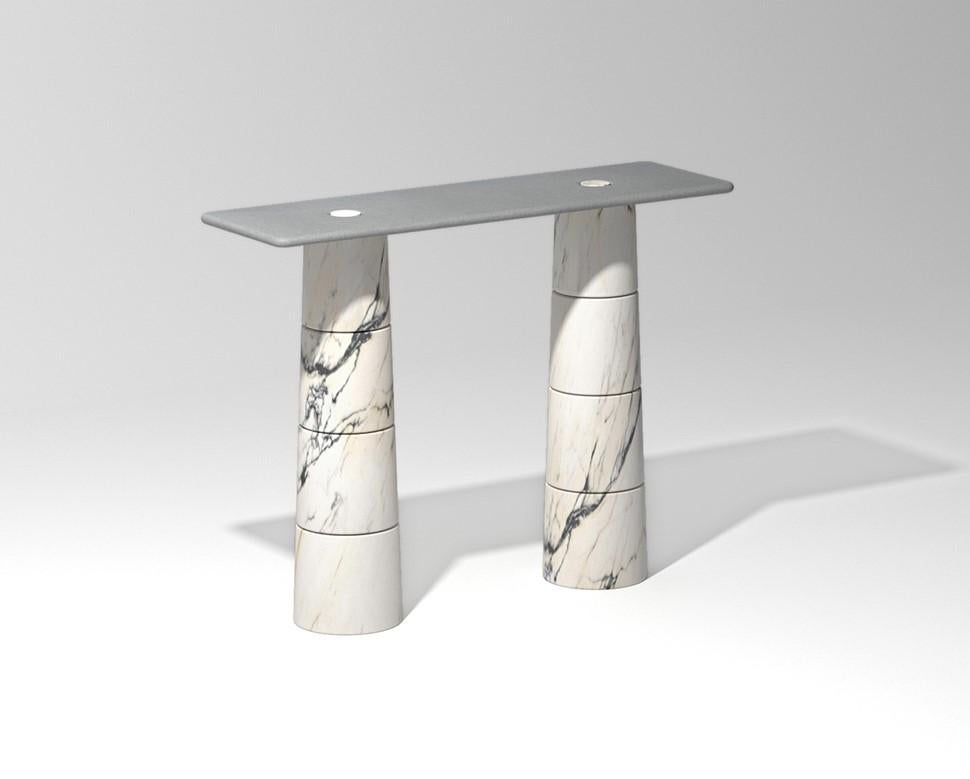 Marble console by by Samuele Brianza
Dimensions: 130 x 30 x 75 cm
Materials: 
- Paonazzo Marble 8 blocks
- Raw waxed steel rectangular top

Primo is a modular system made of load-bearing marble elements and shelves that fit together within a