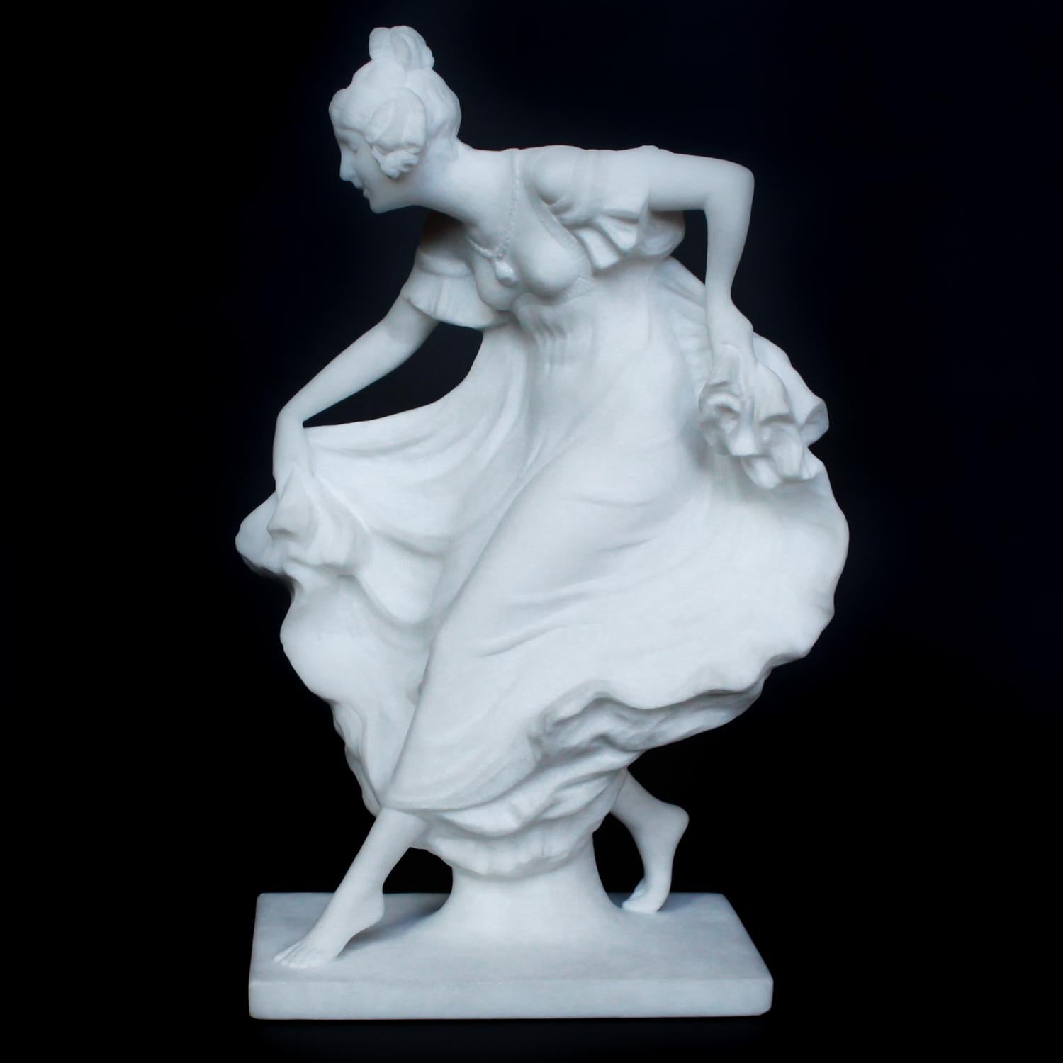 An Art Nouveau, hand carved marble figure of a dancer by Ernst Seger, wearing a flowing dress.
Signed to base.





