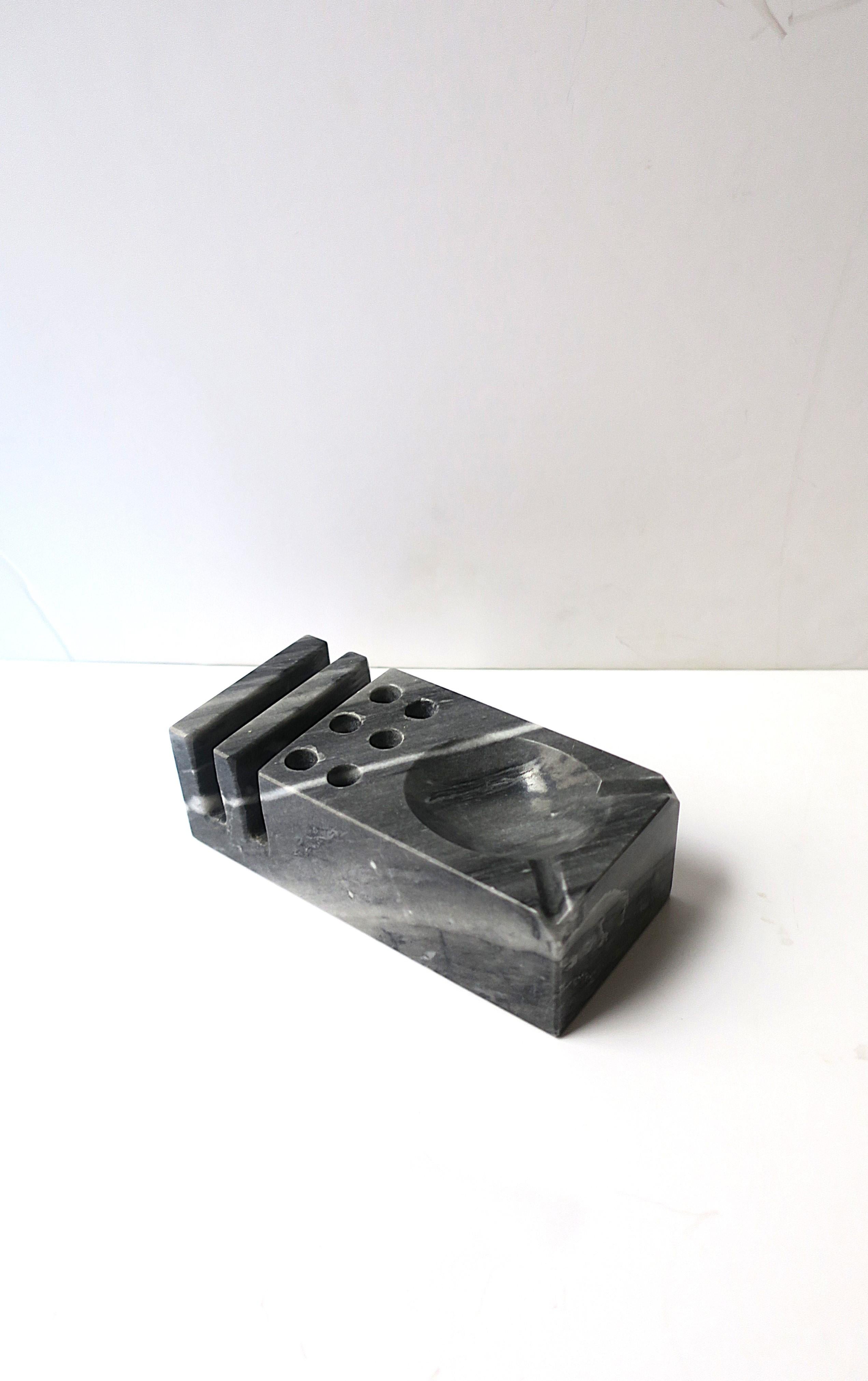 A substantial marble desk pen/pencil/marker holder organizer, in the modern style, Midcentury Modern design period, circa mid-20th century. Organizer can hold small pieces of paper, writing utensils (six of them), and has a small well area for